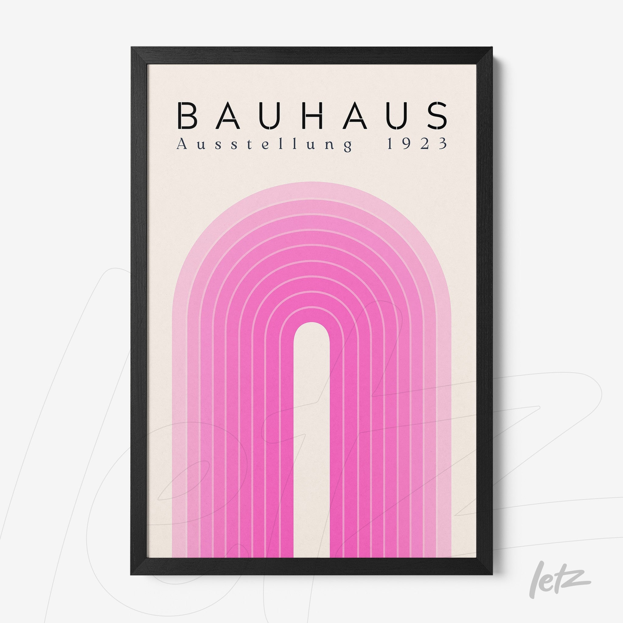 framed graphic art in Bauhaus style featuring pink arches on a beige background with black frame