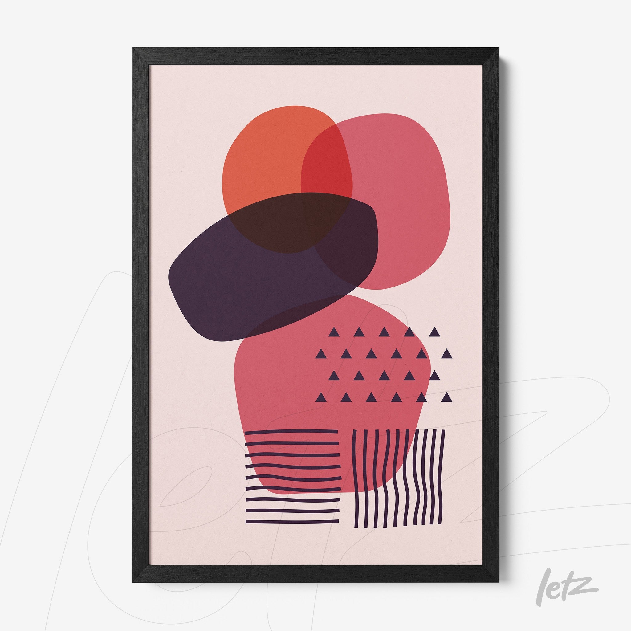 abstract poster with organic shapes in shades of pink and red in a thin black frame
