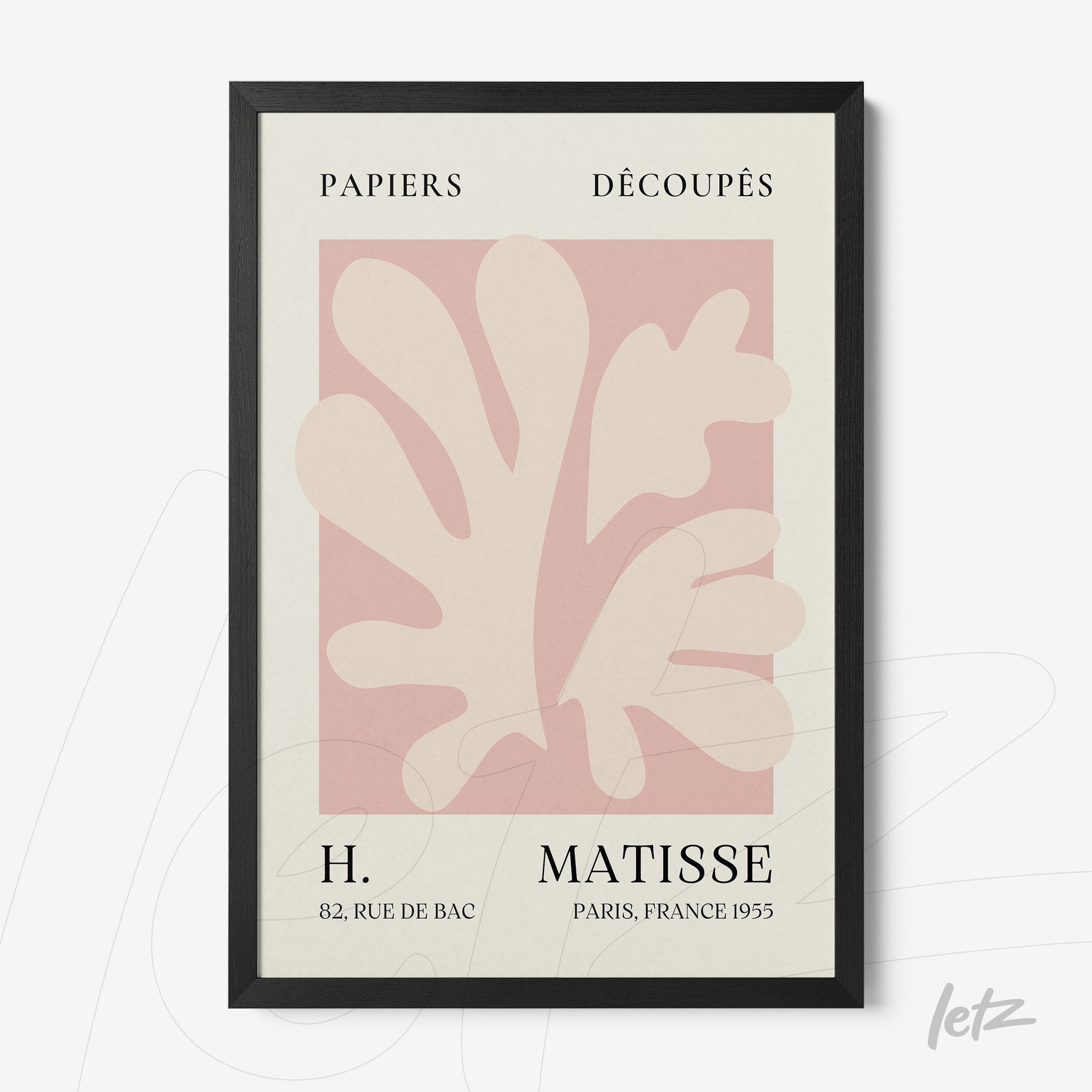 framed modern art featuring organic shapes in pink and cream colors