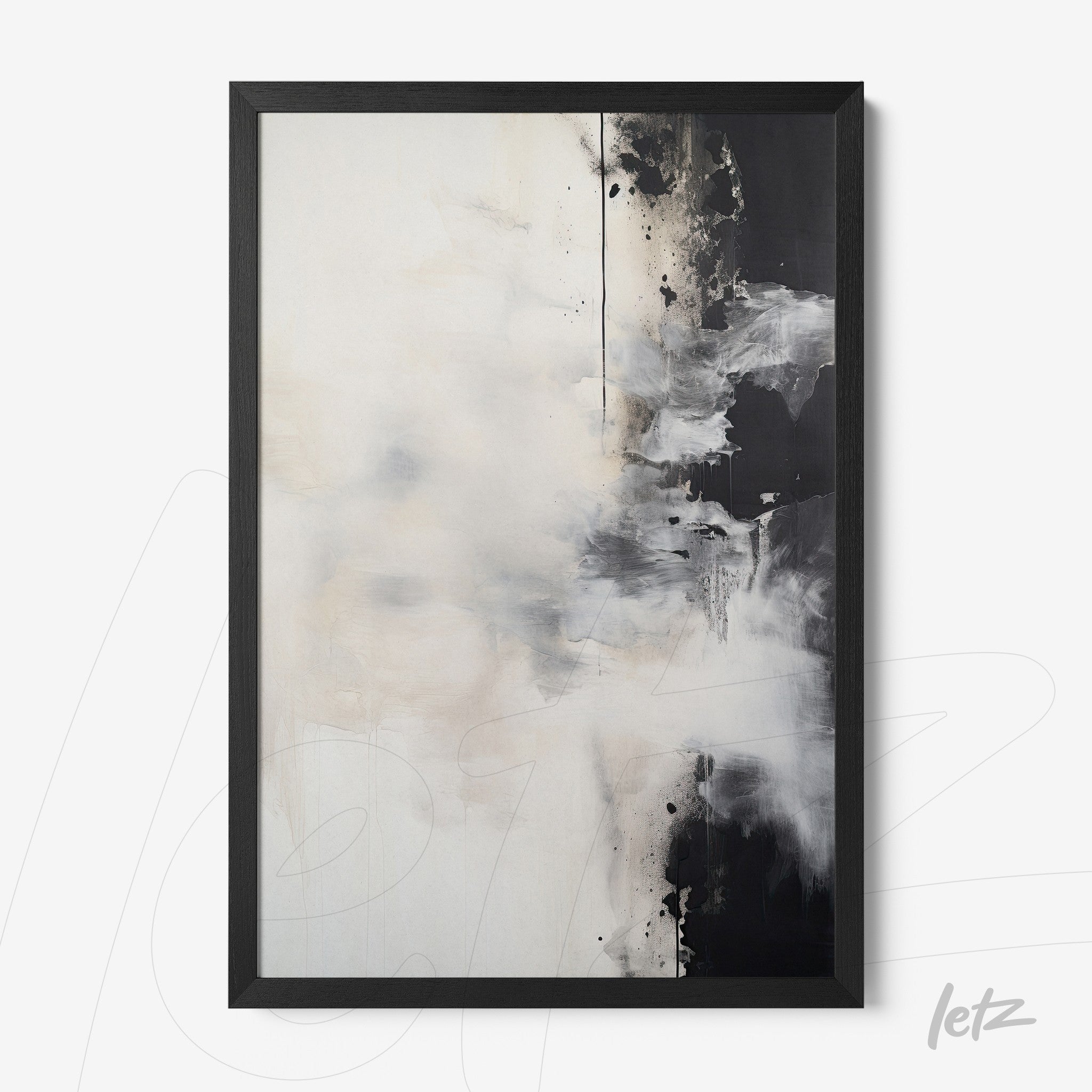abstract wall art in shades of white and black with black frame