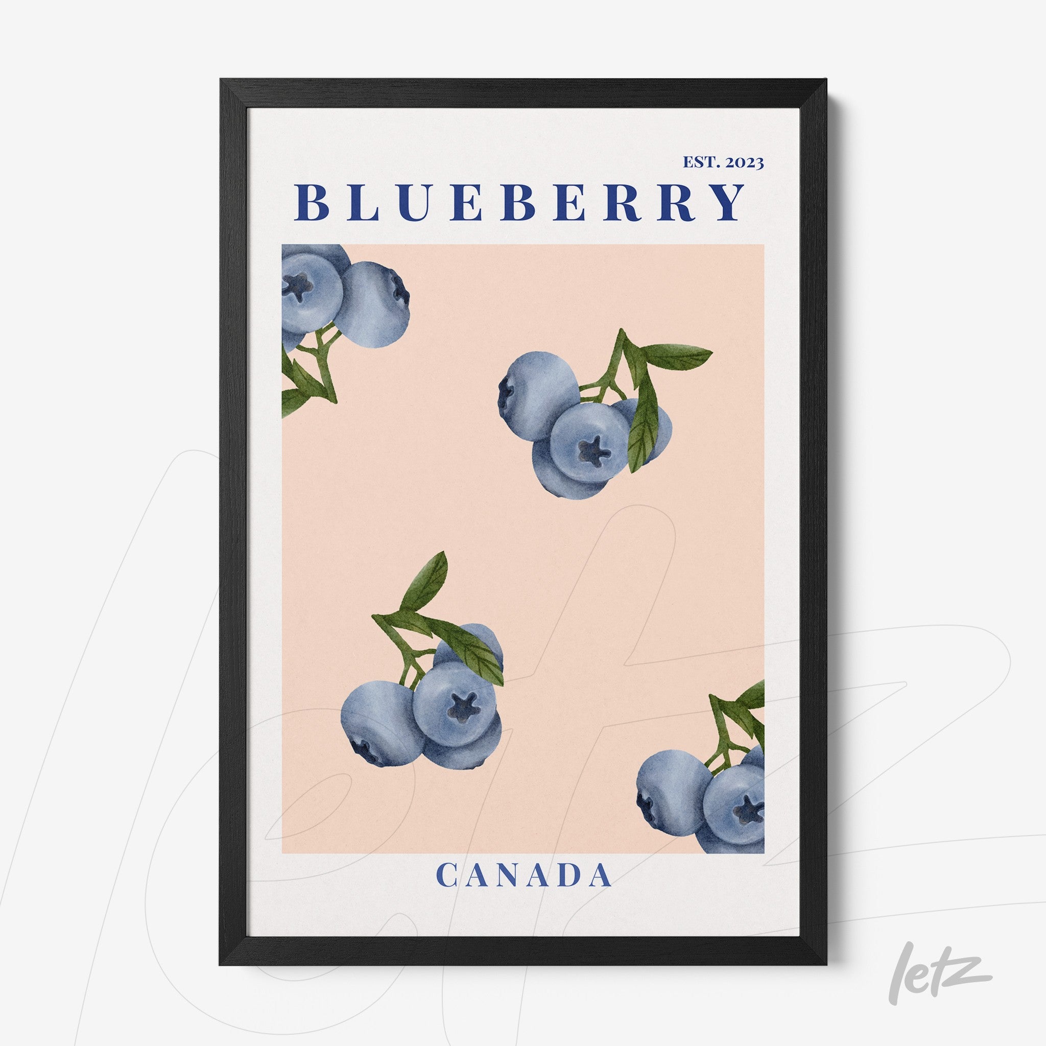 framed art featuring blueberries on light pink background with black frame