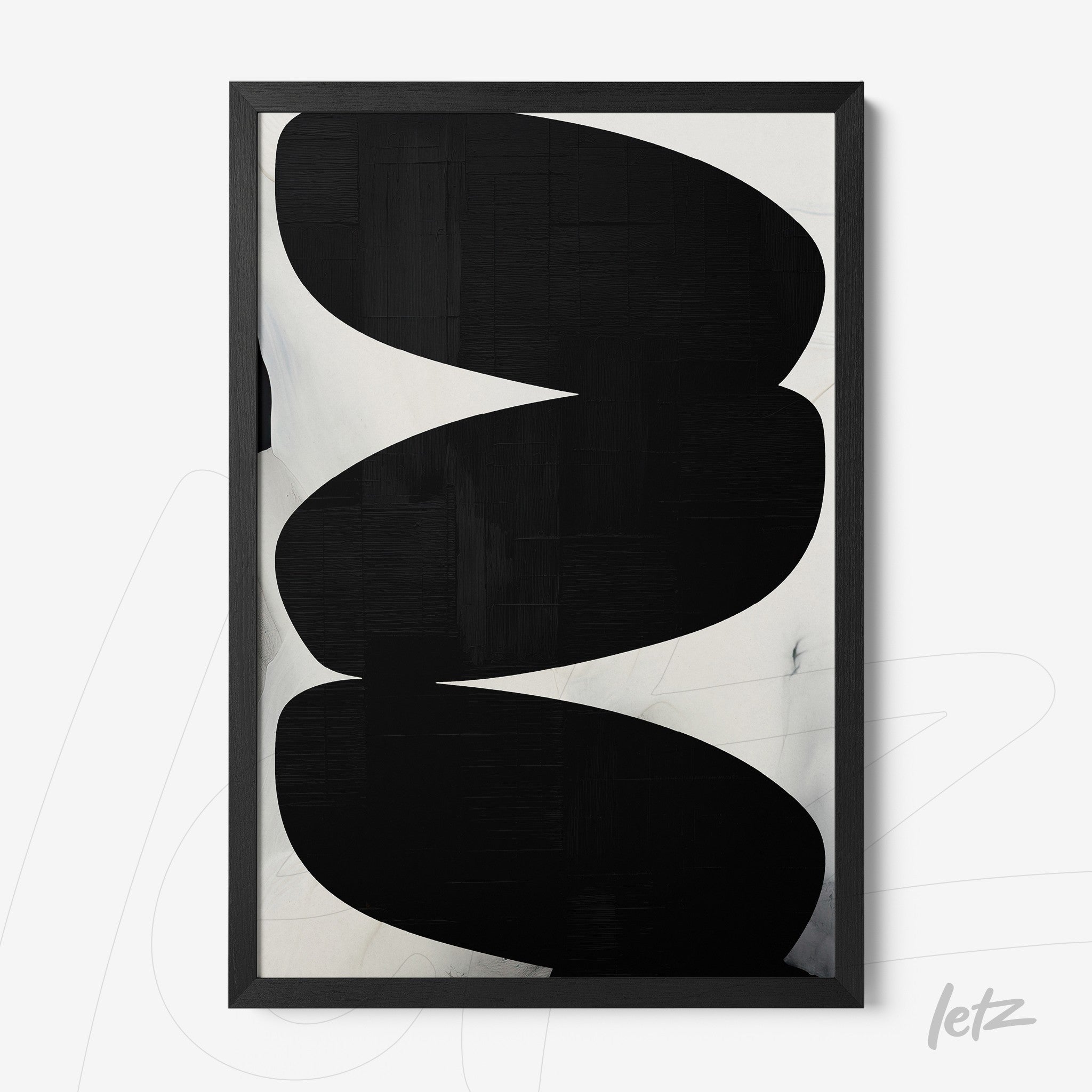 abstract wall art in black and white framed in black frame
