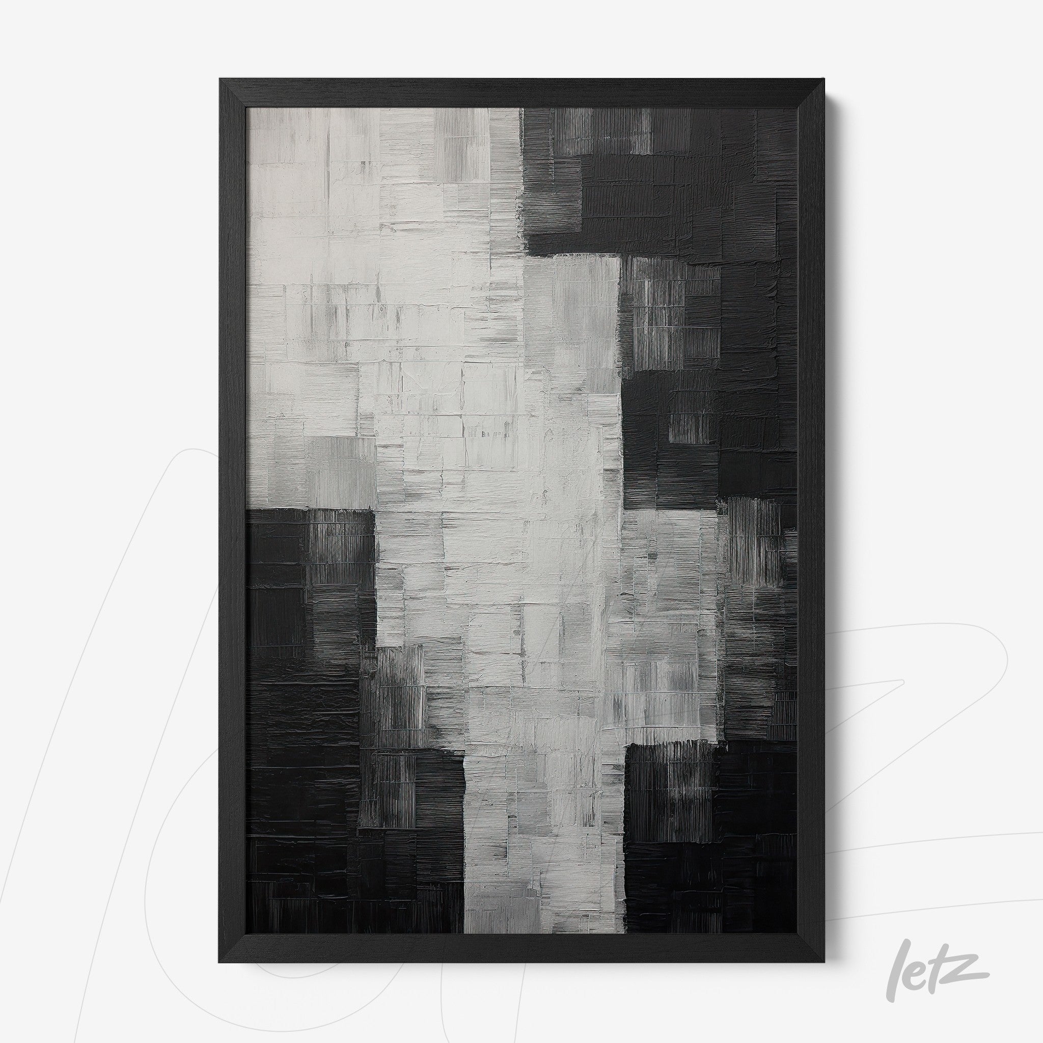 abstract wall art in black and white tones with textured pattern in a black frame