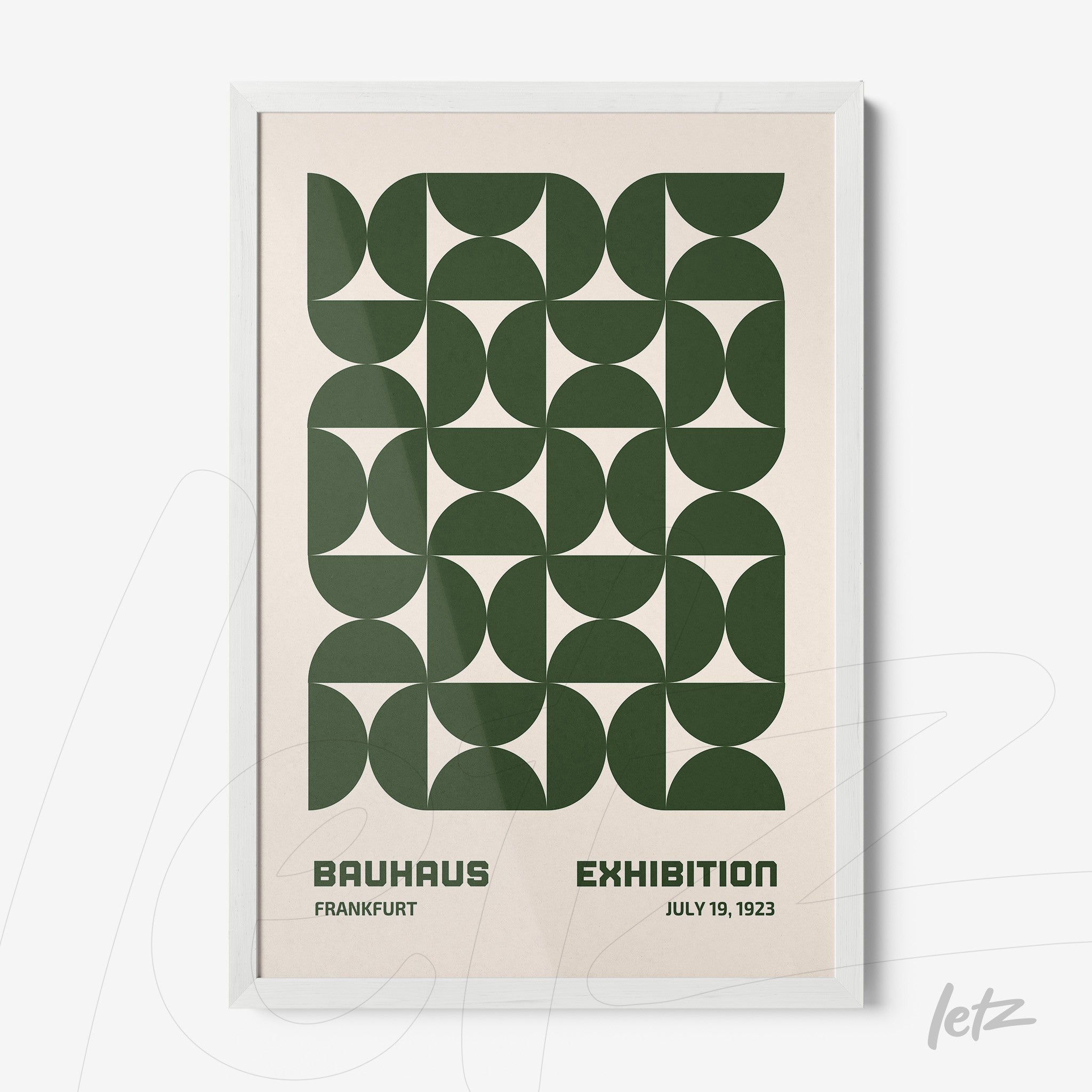 poster print featuring dark green geometric design displayed in white frame