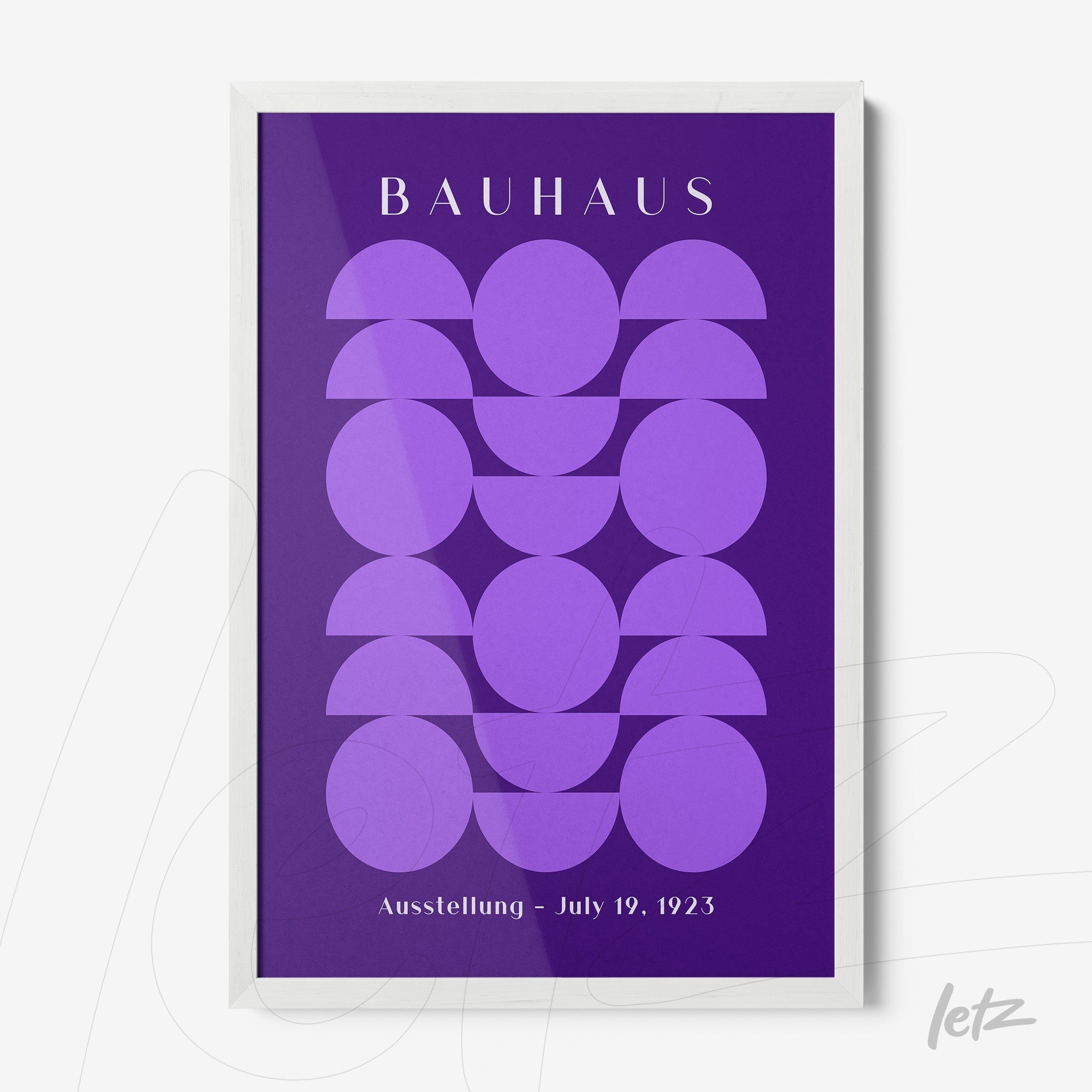 poster featuring geometric design in purple with circles and semicircles displayed in white frame