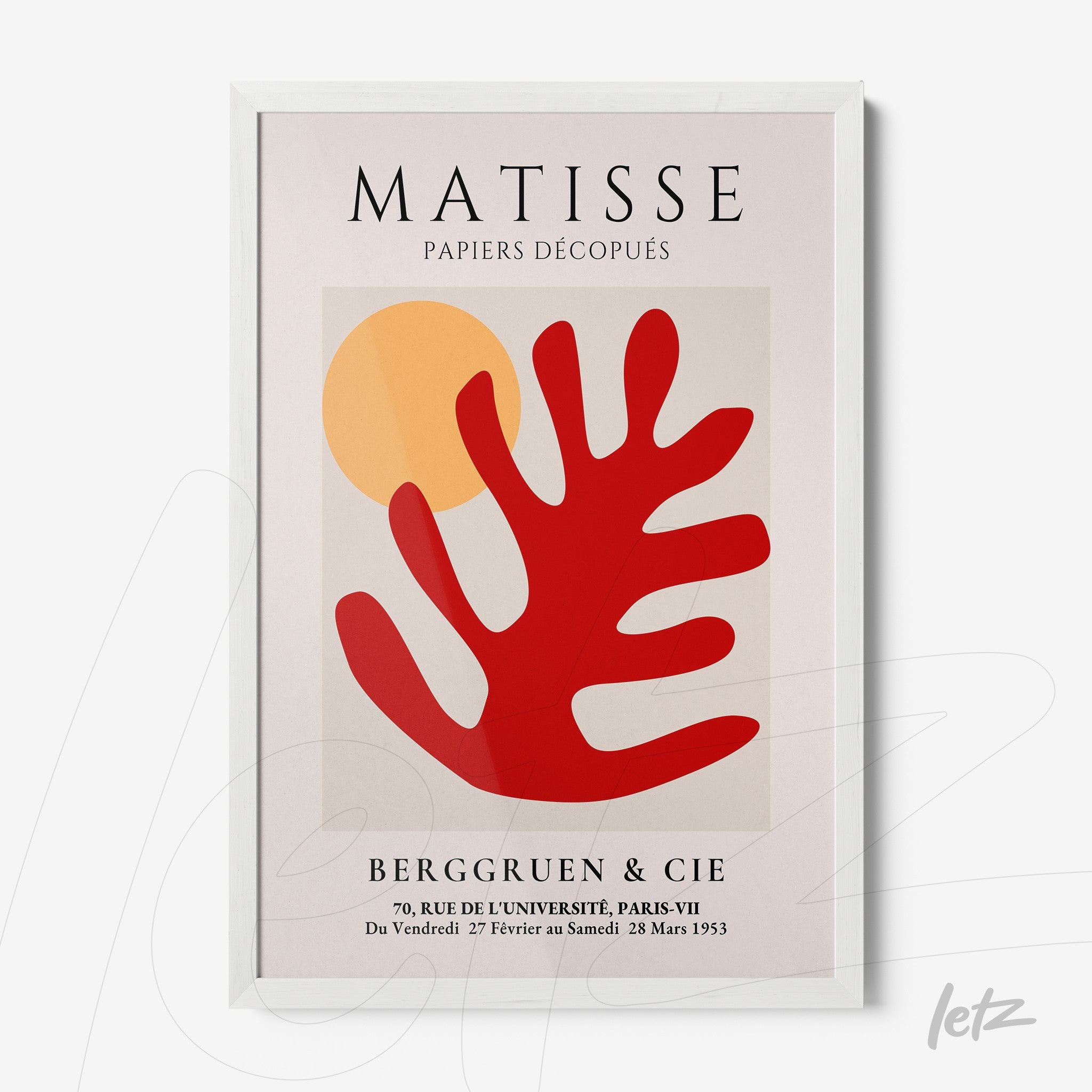 framed wall art featuring cut-out design in red and yellow with organic shapes