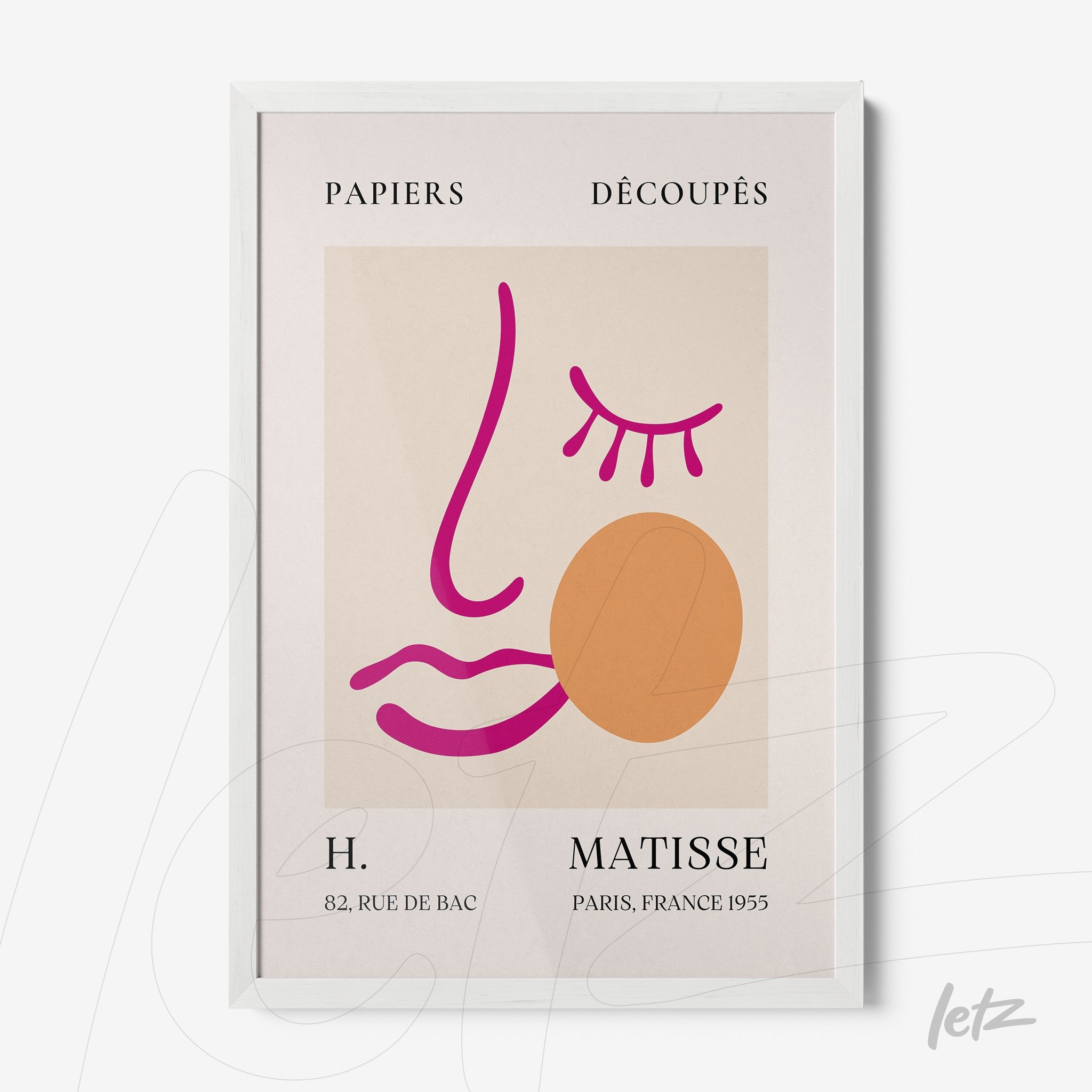 framed wall art featuring a minimalist illustration of a stylized face with pink and orange lines