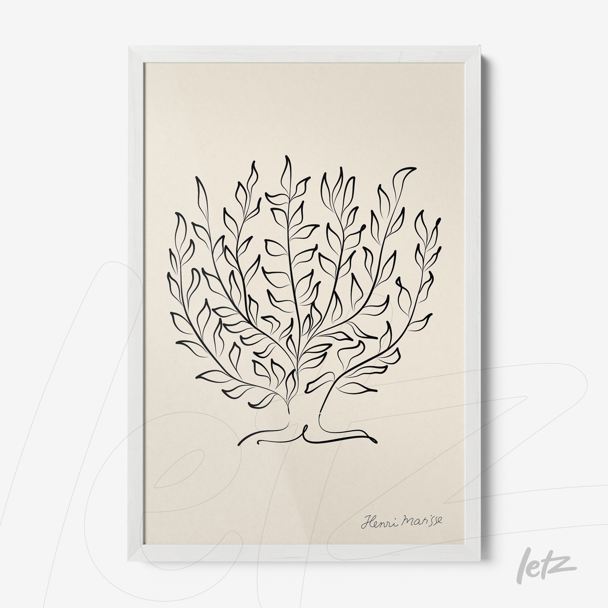 minimalist framed artwork of leaf outlines in black on a light background