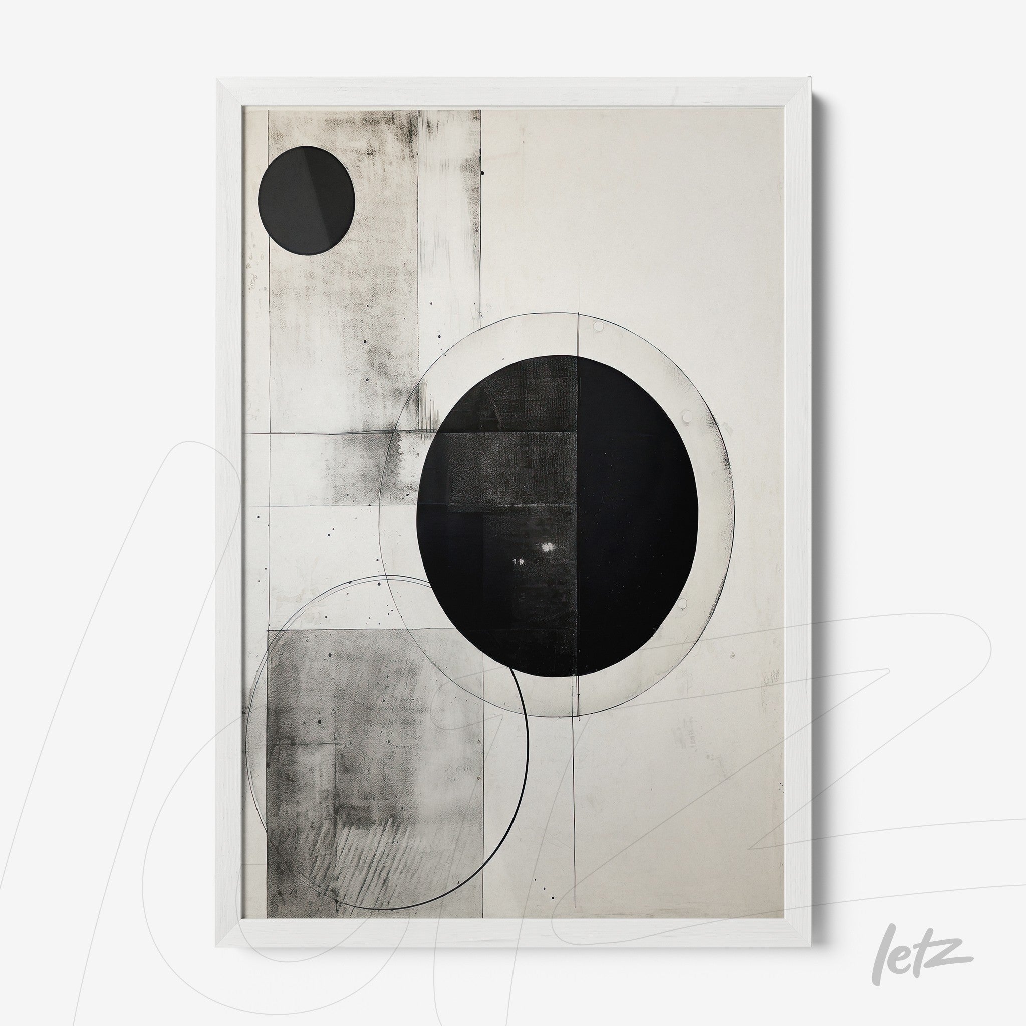 abstract wall art in black and white featuring black circles on a light background with a white frame