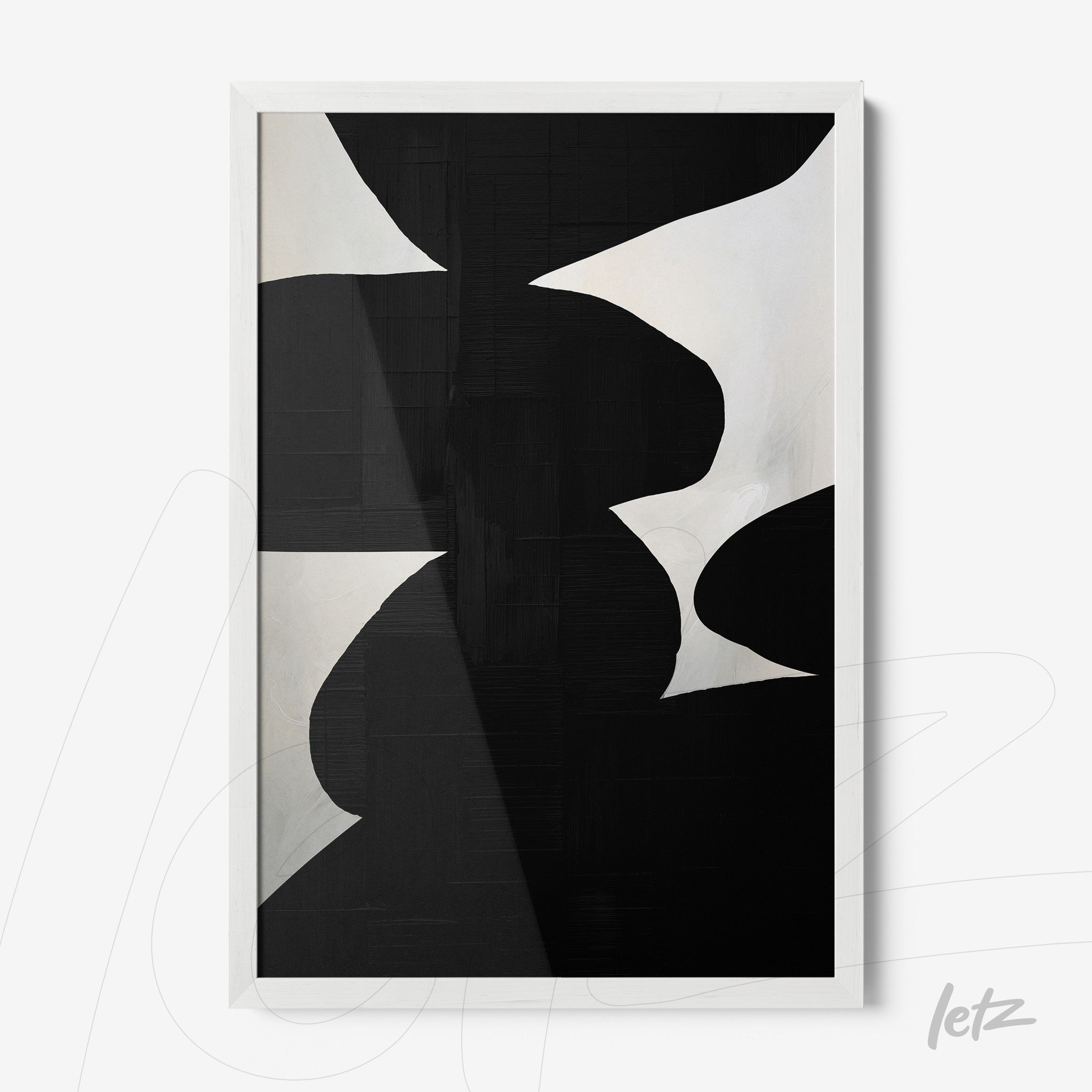 abstract wall art in black and white featuring organic shapes in white frame