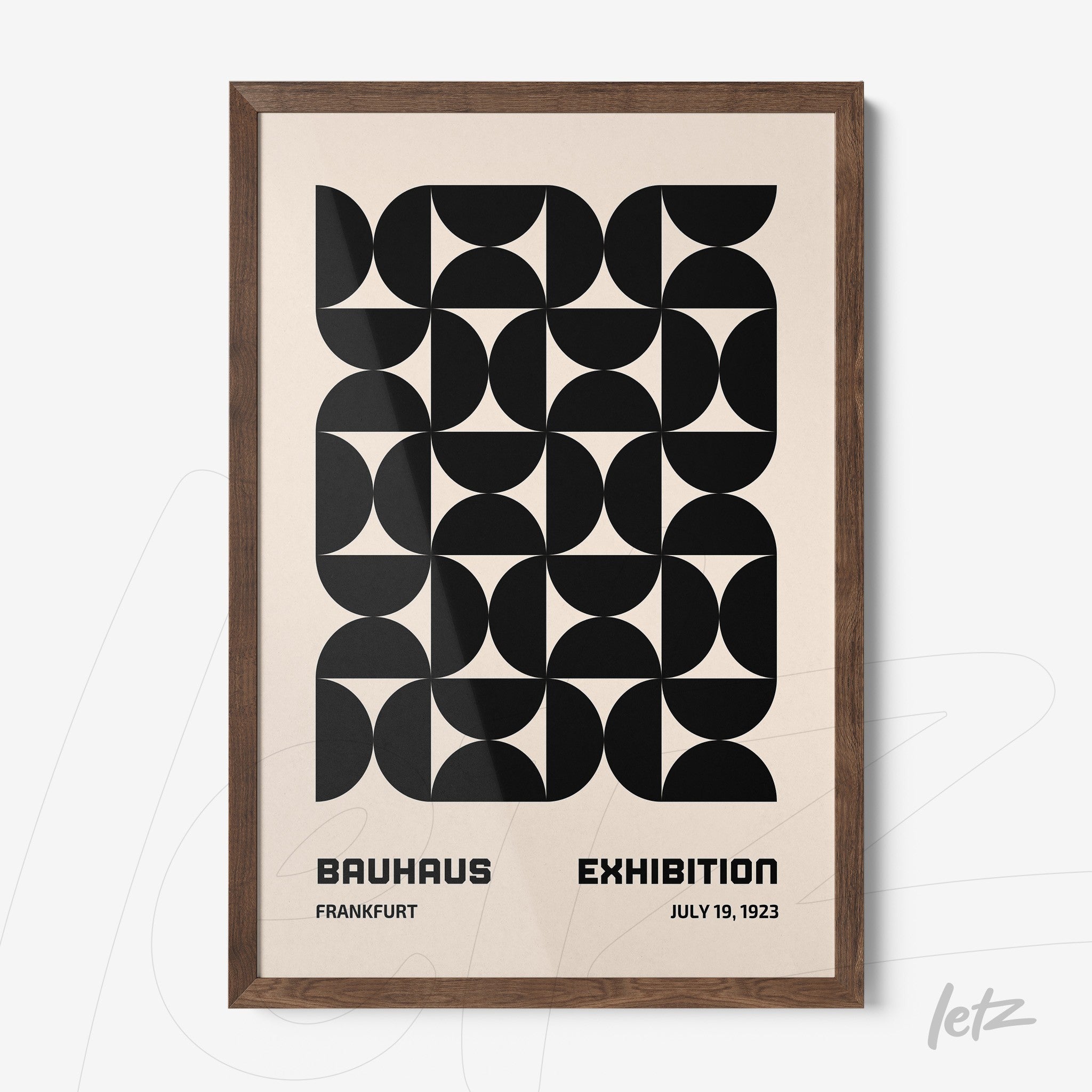 poster featuring black geometric design inspired by Bauhaus school in dark wood frame
