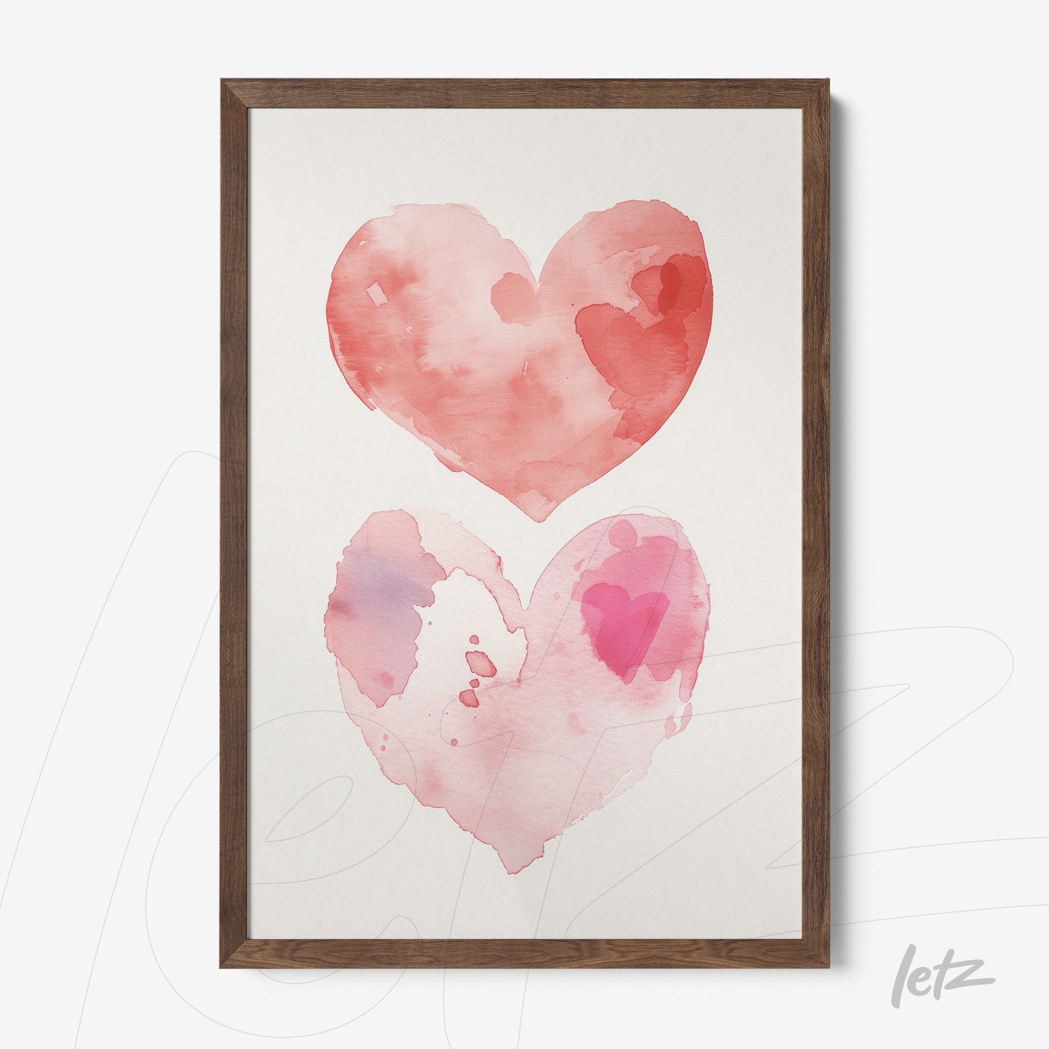 framed artwork featuring watercolor heart illustrations in shades of pink and red with dark wood frame