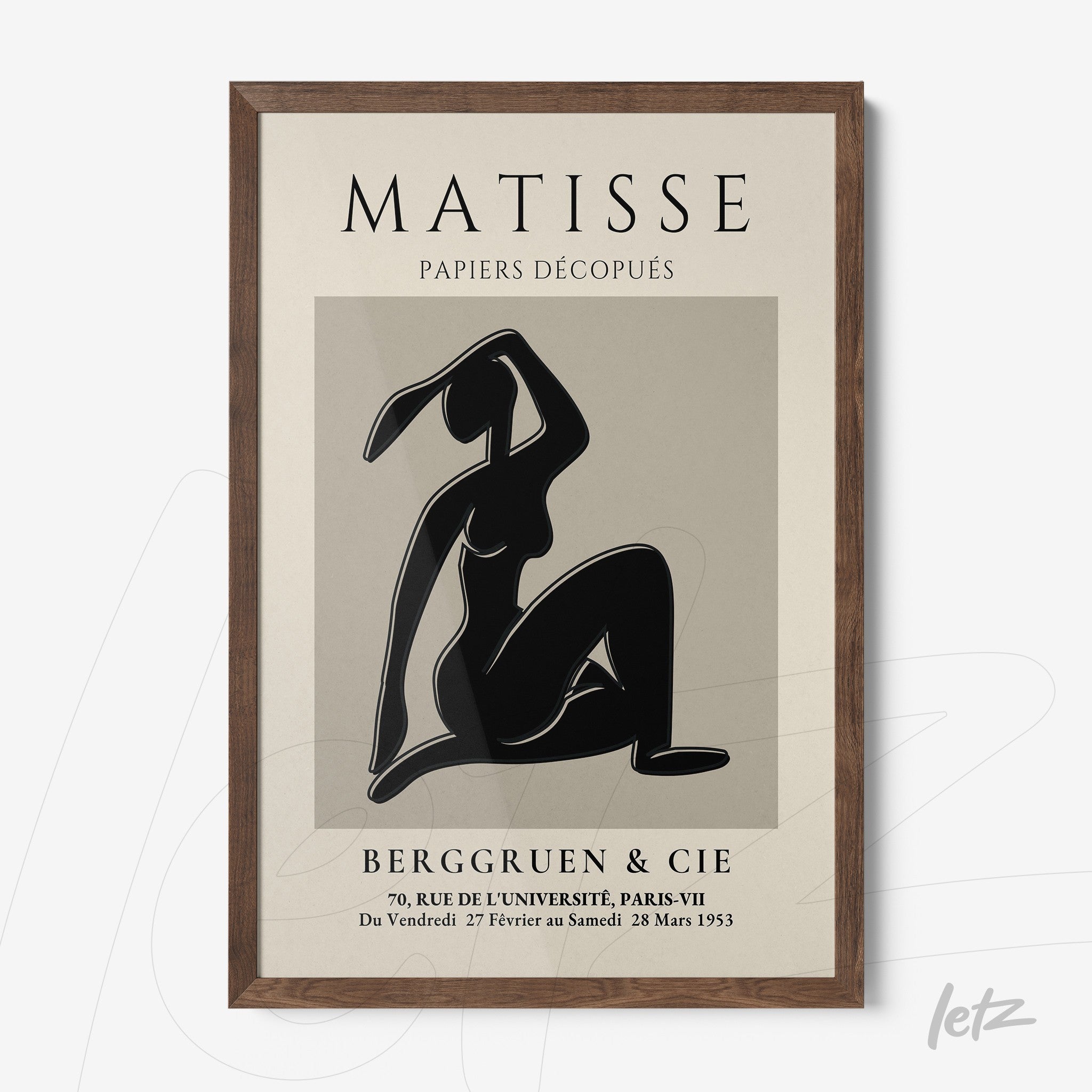 framed wall art featuring henri matisse's cut-outs in dark wood frame