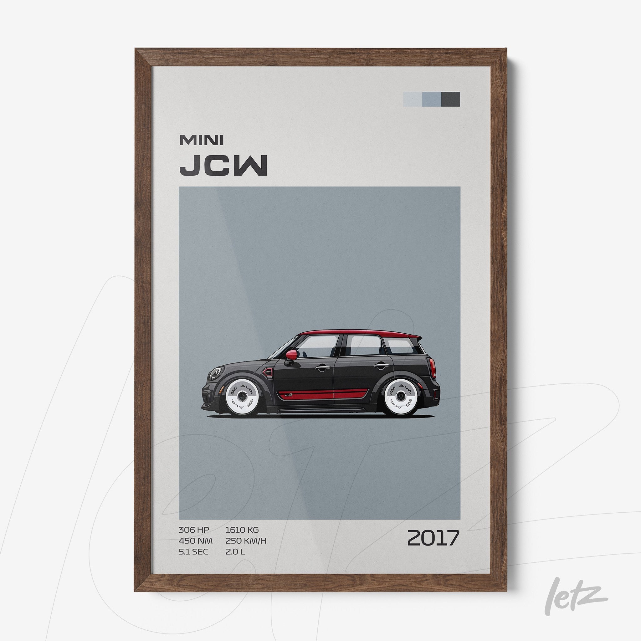 framed graphic art of a 2017 Mini JCW car in dark wooden frame
