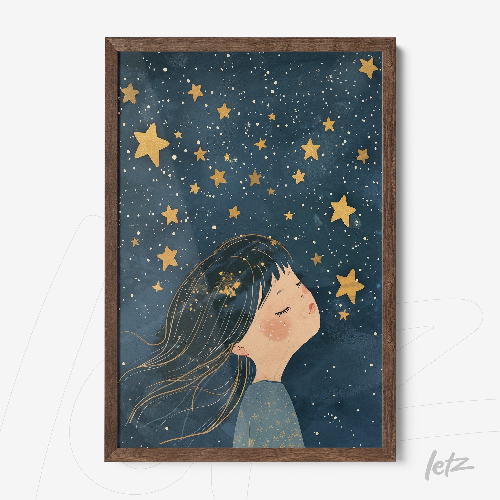 framed wall art featuring a dreaming girl under a starry sky with dark wood frame