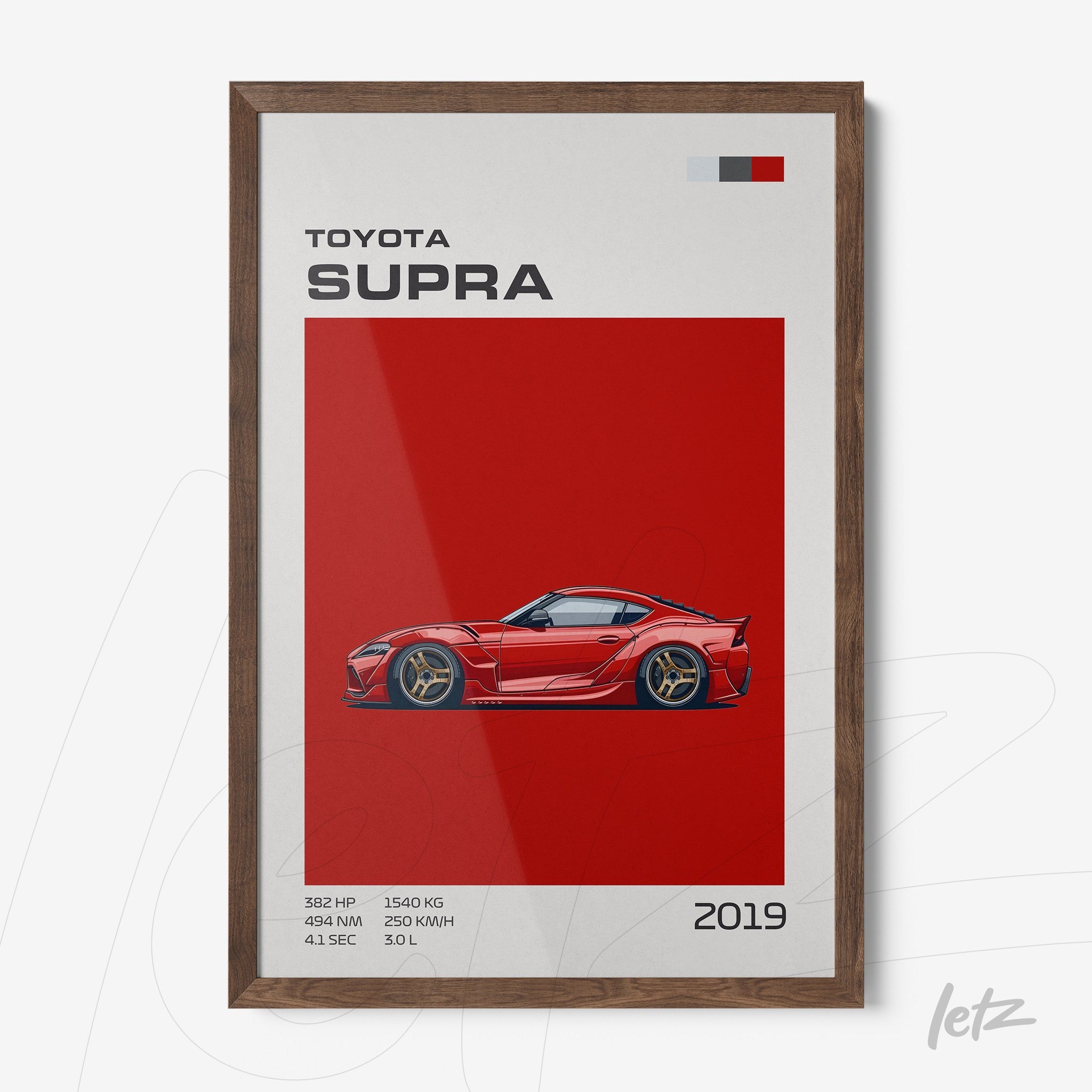 framed art featuring the 2019 Toyota Supra illustrated against a red background with a dark wood frame