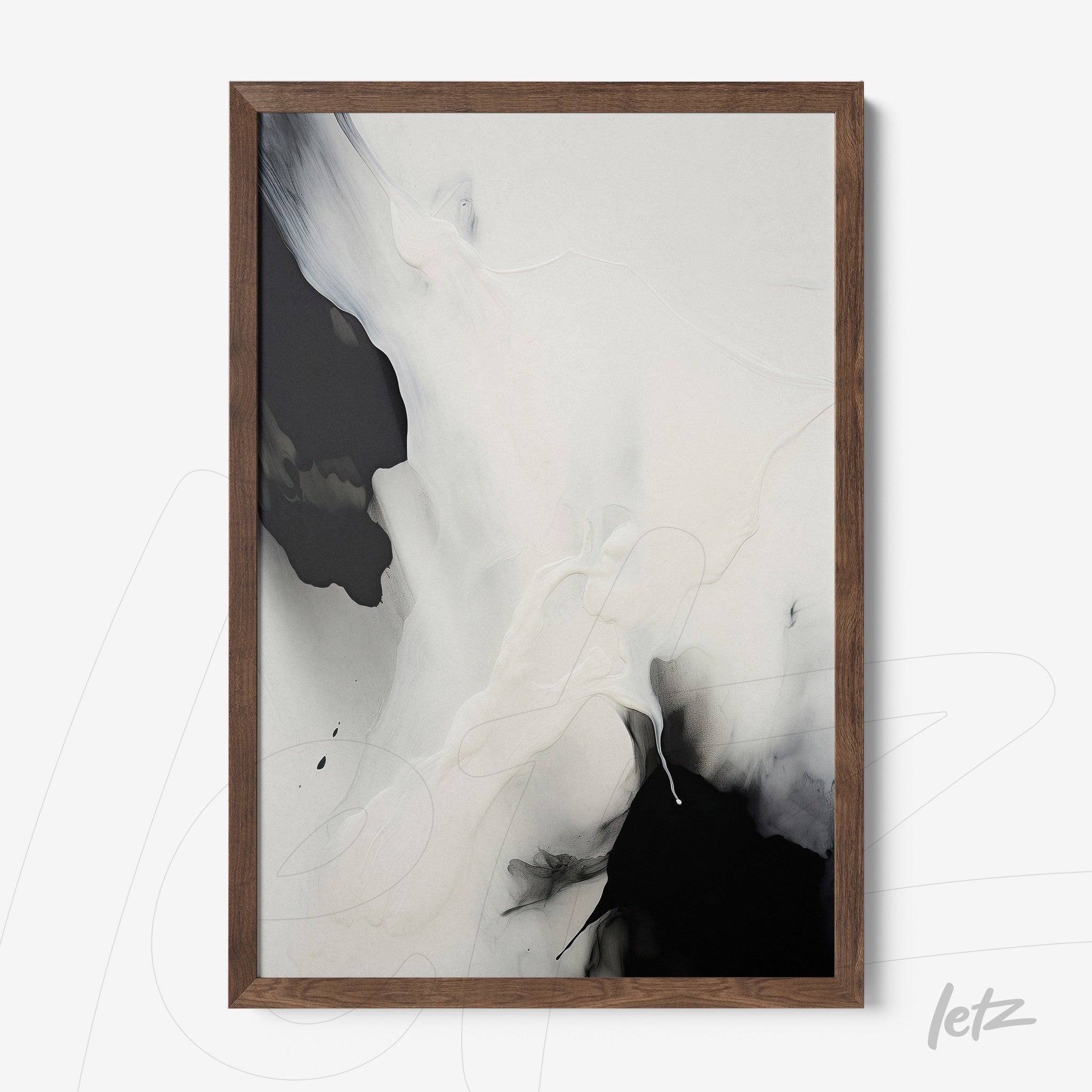 abstract artwork in black and white shades, framed in dark wood