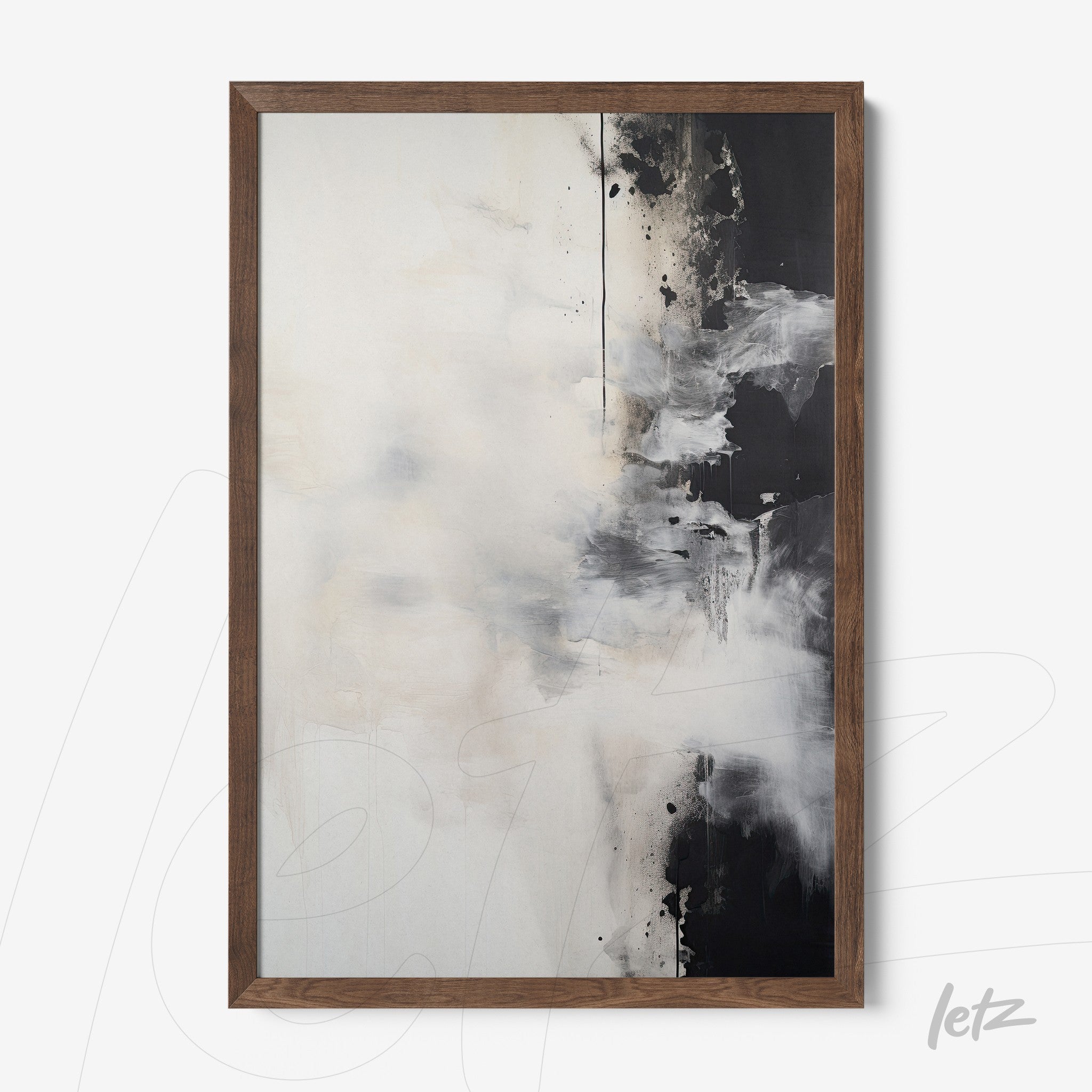 abstract wall art in shades of black, white, and gray with a dark wood frame