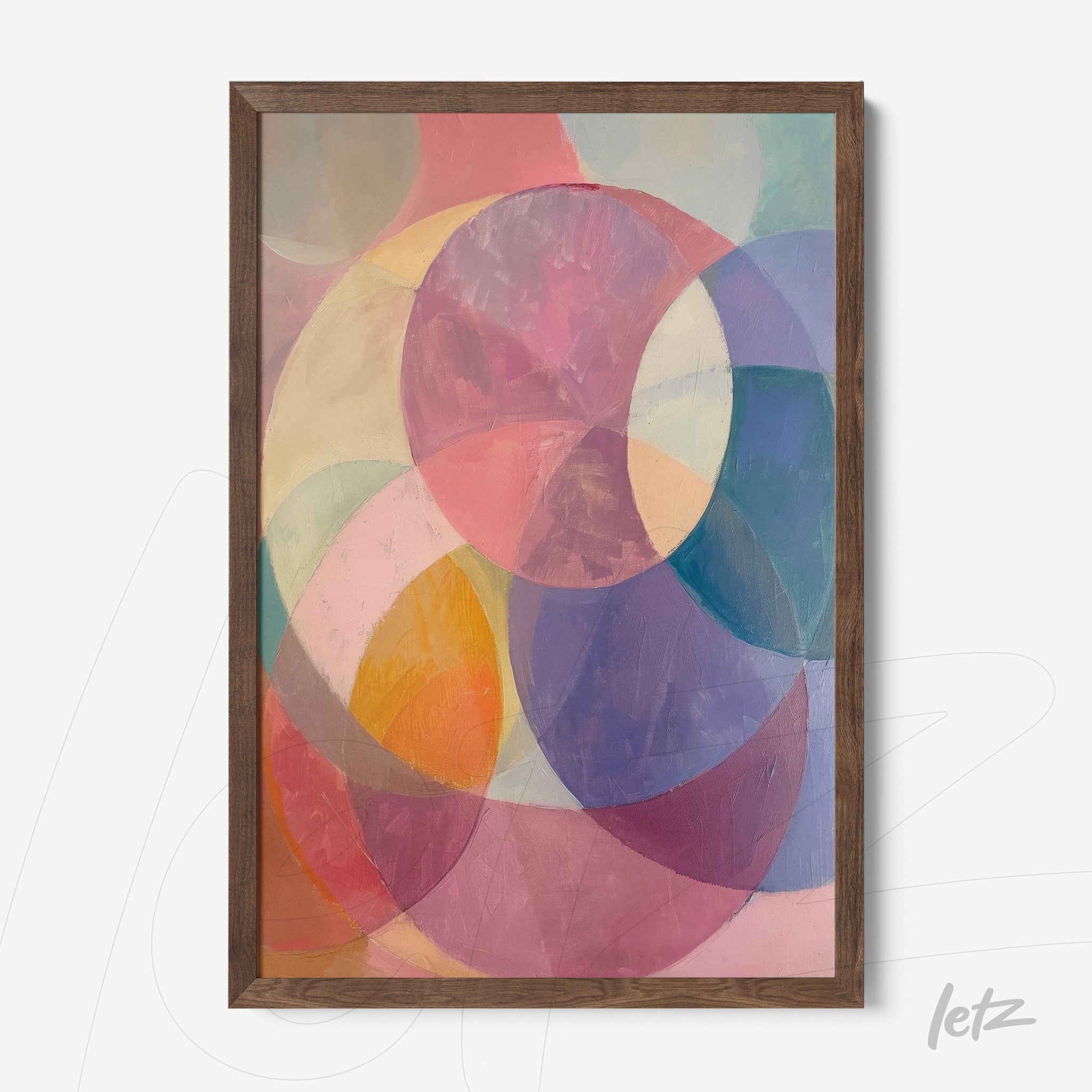 framed artwork featuring an abstract composition of colorful circles on a pastel background with dark wood frame