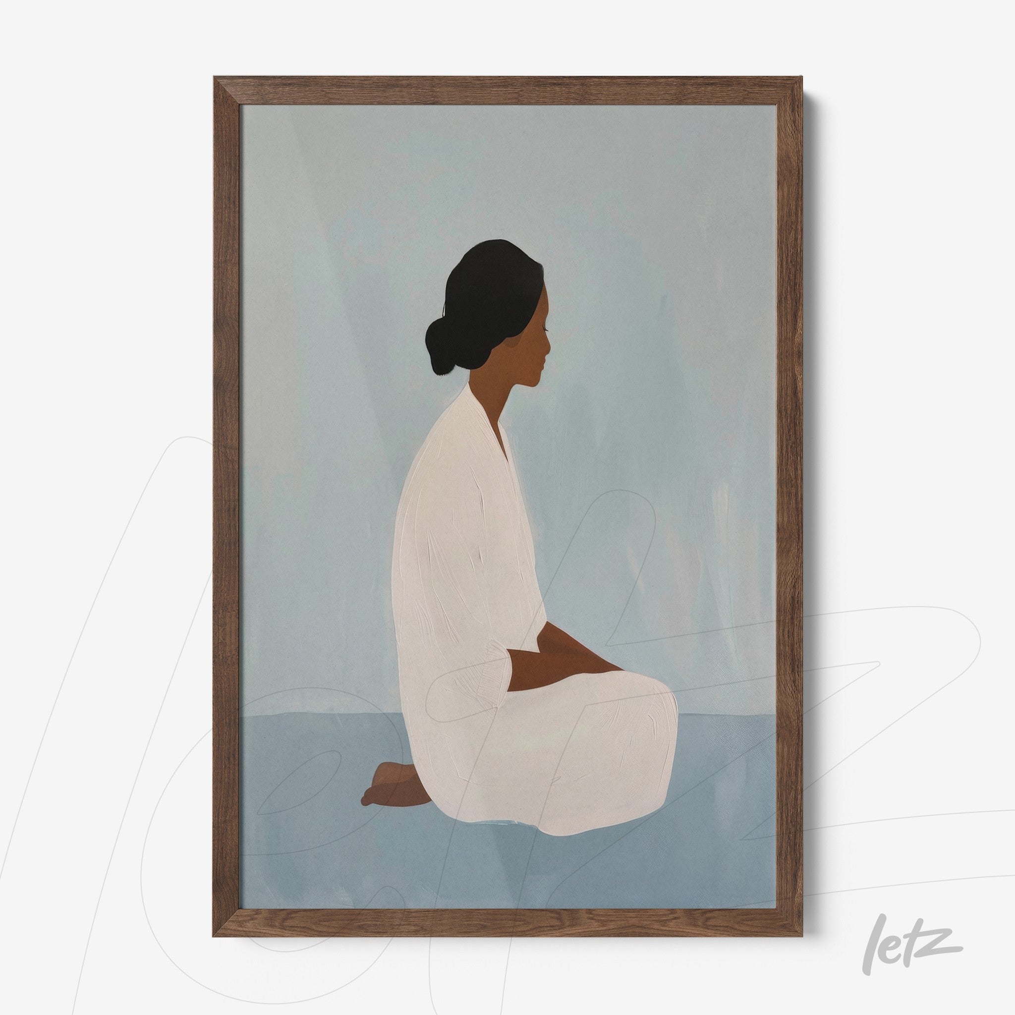 framed wall art featuring a minimalist depiction of a woman in a meditative pose with dark wood frame