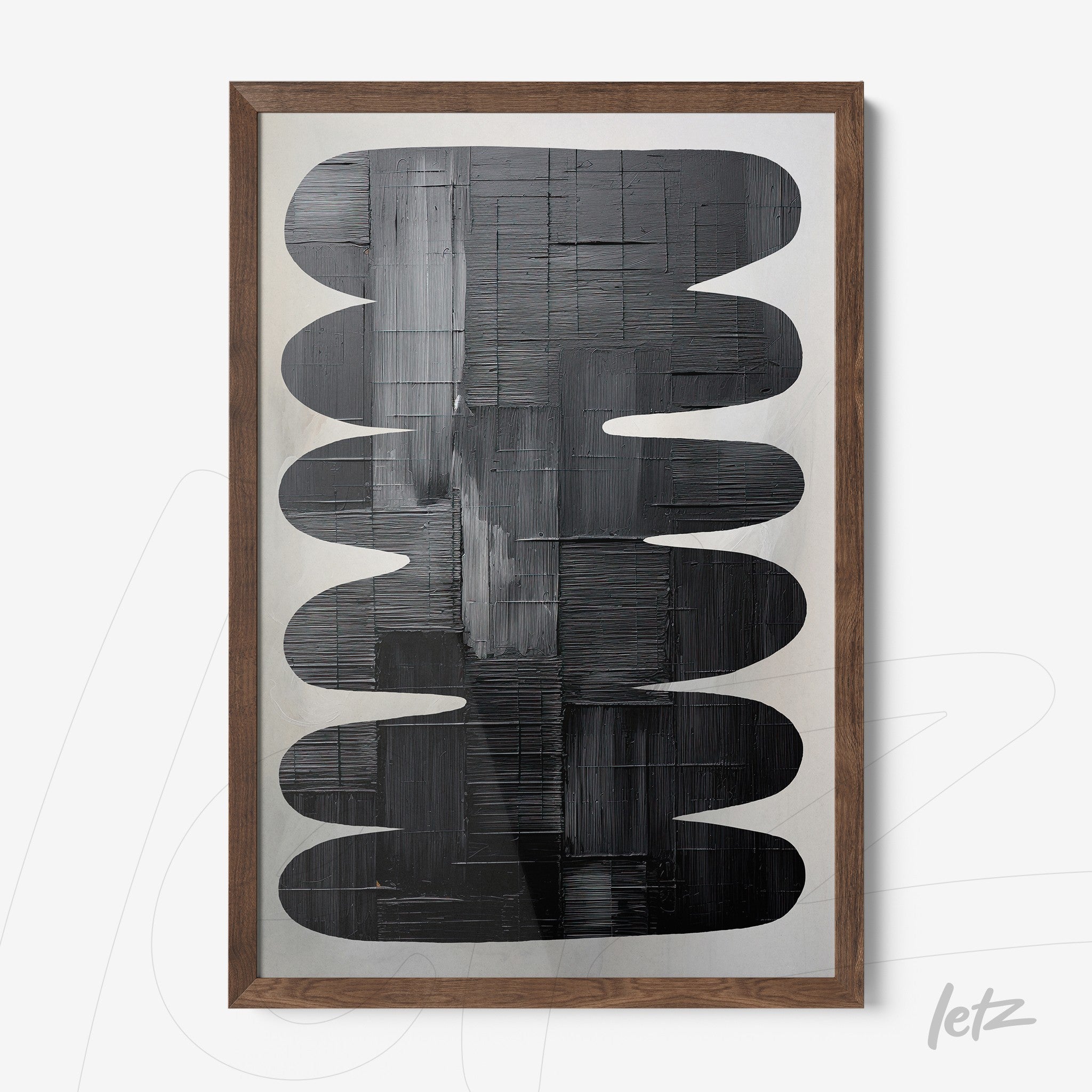 abstract wall art in black and gray tones featuring rounded shapes with a light wood frame