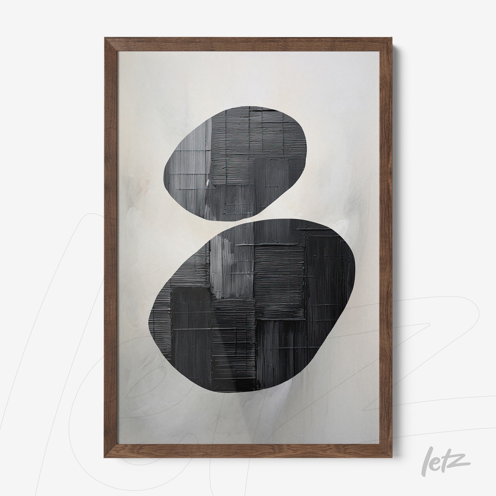 abstract wall art in black and white with light wood frame featuring oval shapes