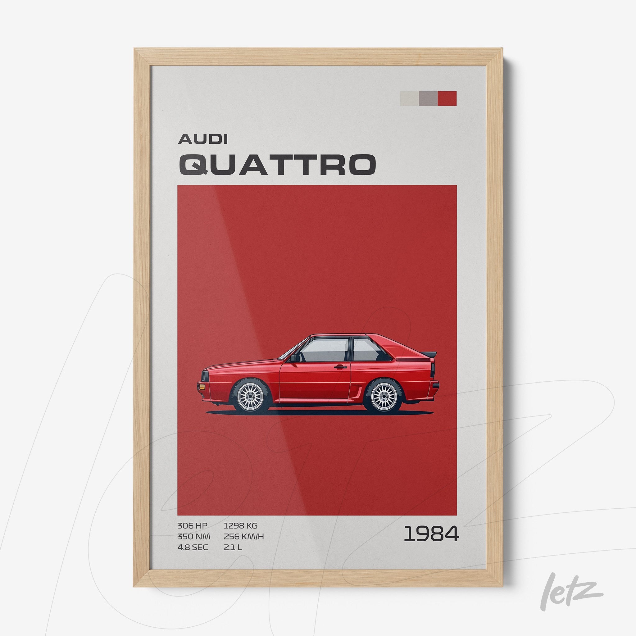 framed wall art featuring a digital illustration of the 1984 Audi Quattro on a red background with light wood frame