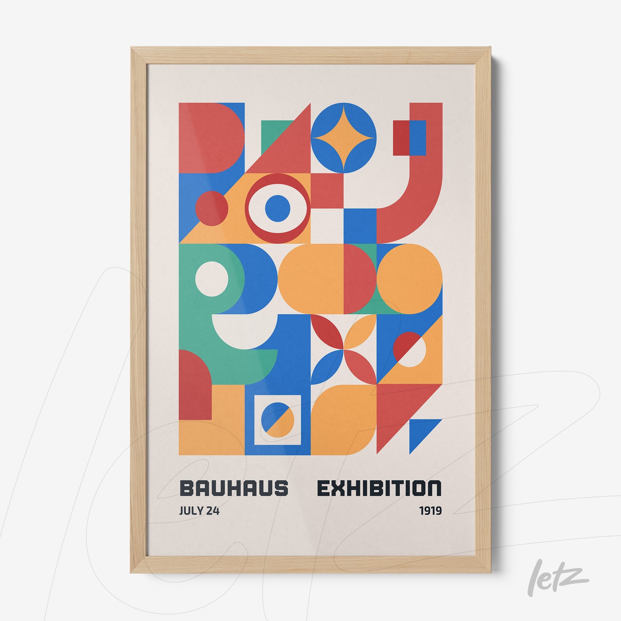 poster print with geometric bauhaus style design displayed in a light wood frame