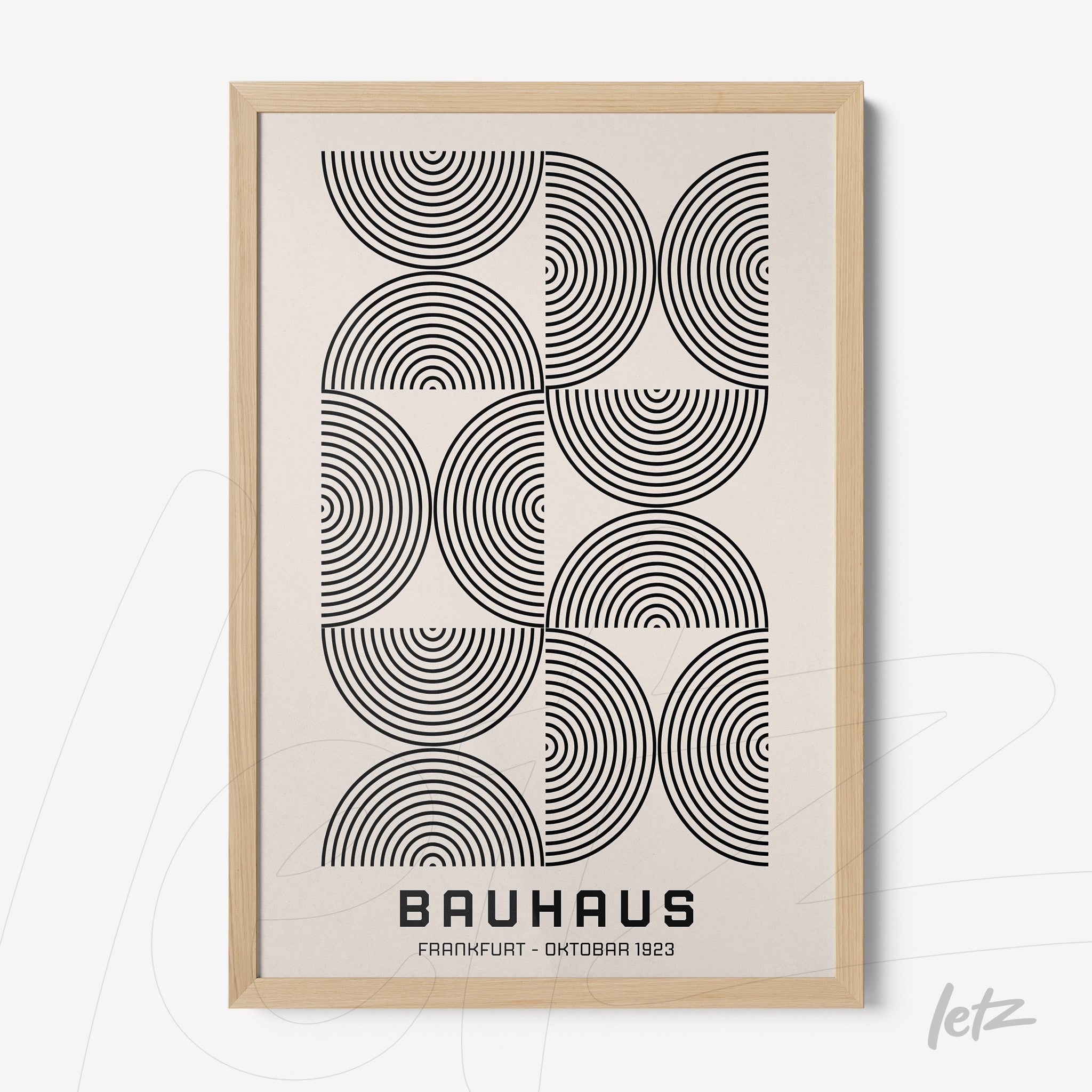 poster print featuring black and white geometric art of concentric semicircles framed in light wood