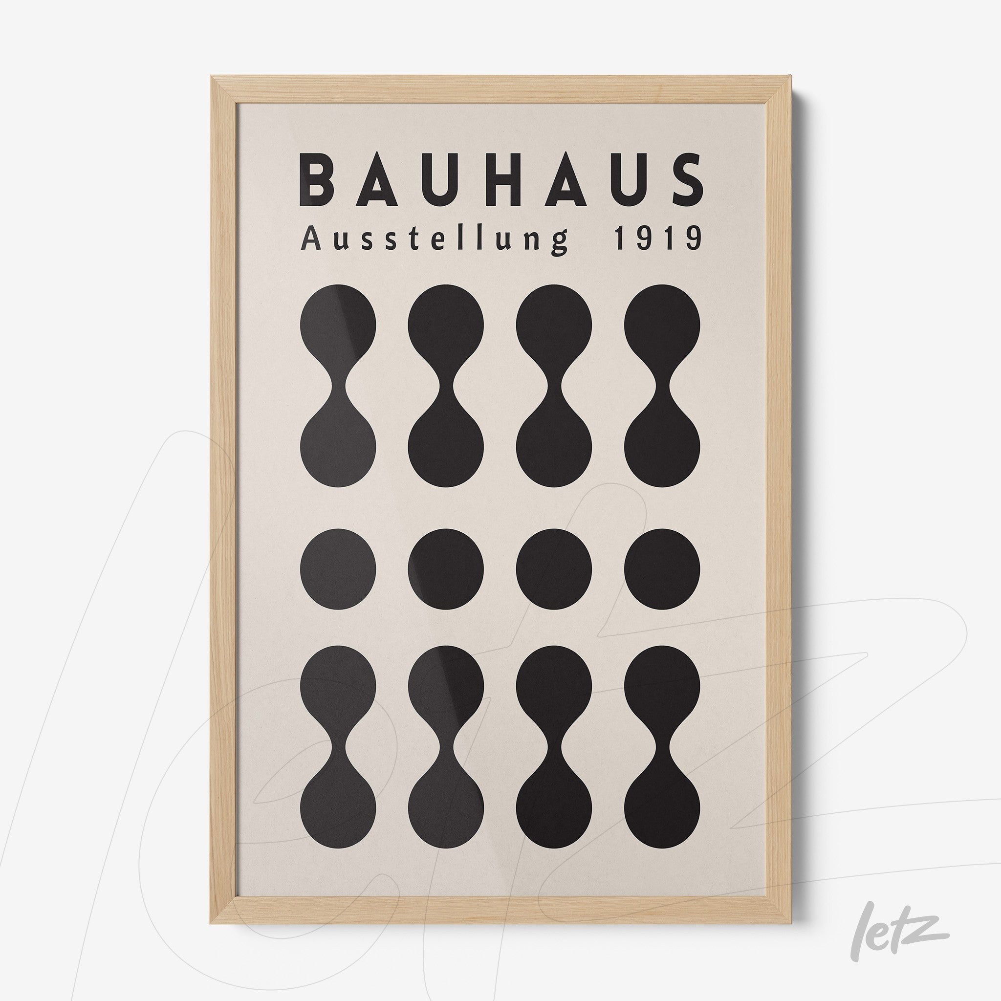 poster print with bauhaus style geometric design from 1919 in light wood frame