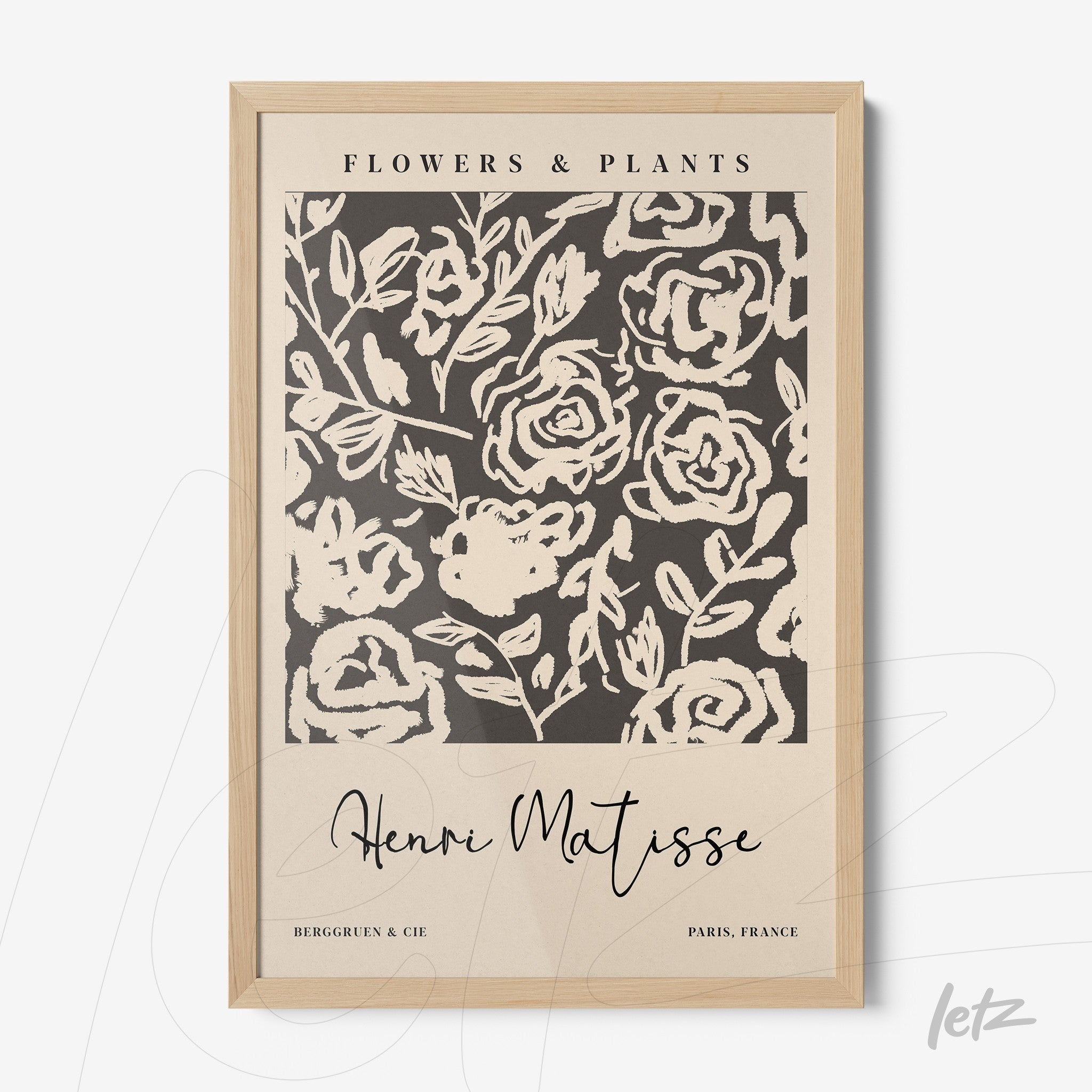 decorative wall art featuring abstract flower design on dark background with light wood frame