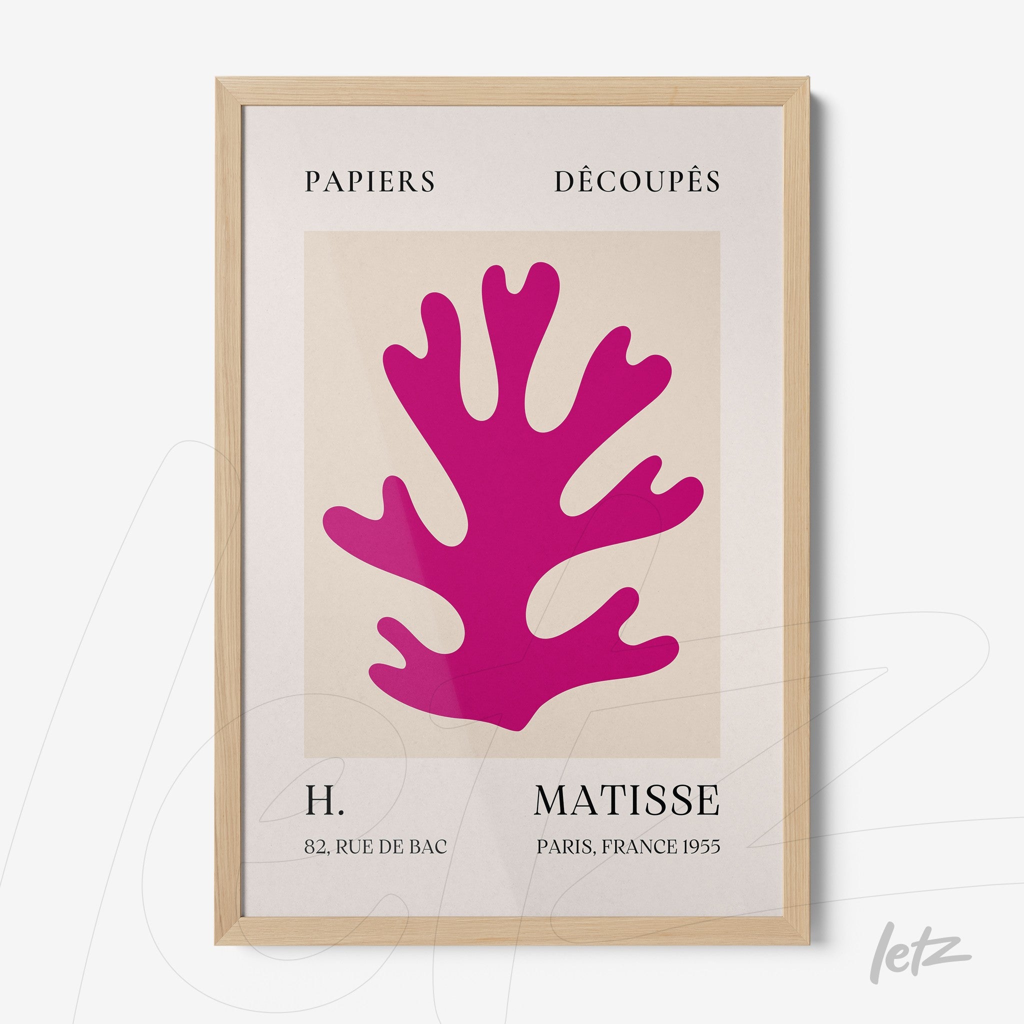 framed artwork with cut paper design of coral shape in pink