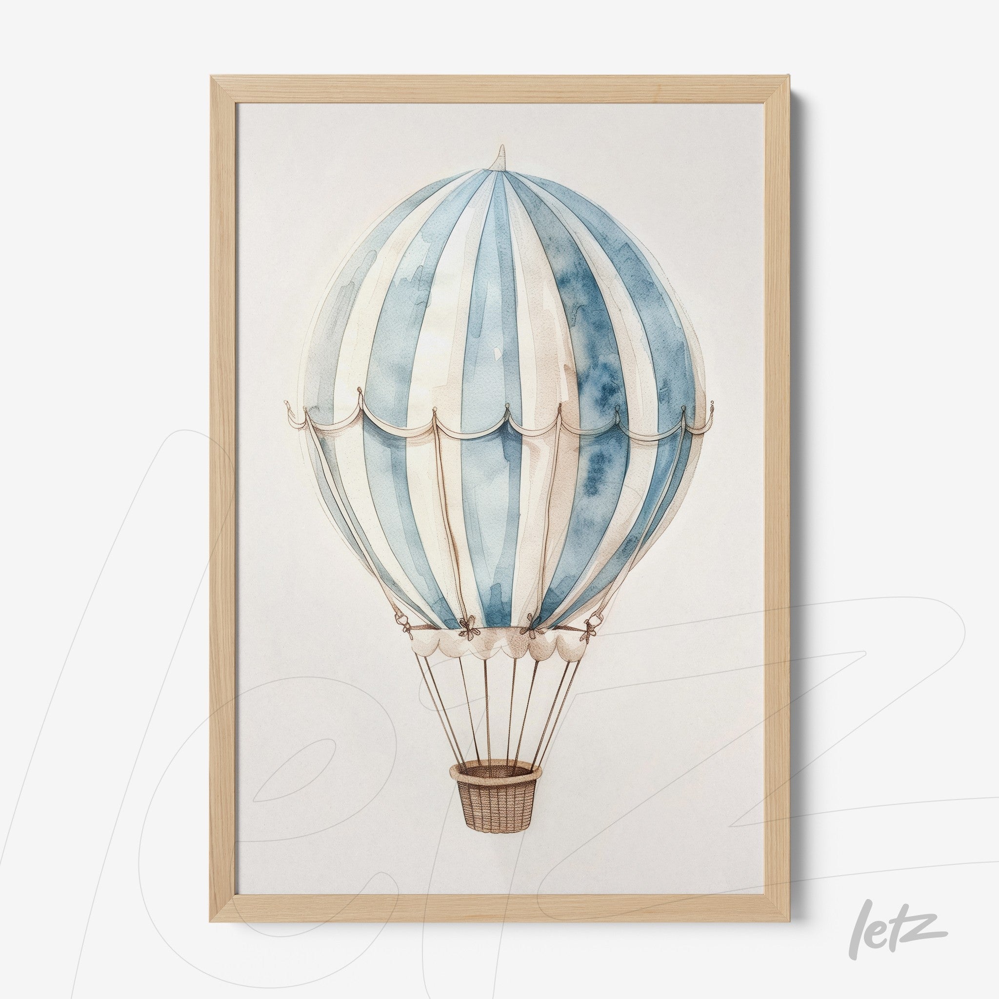 framed wall art of a hot air balloon in shades of blue with light wooden frame