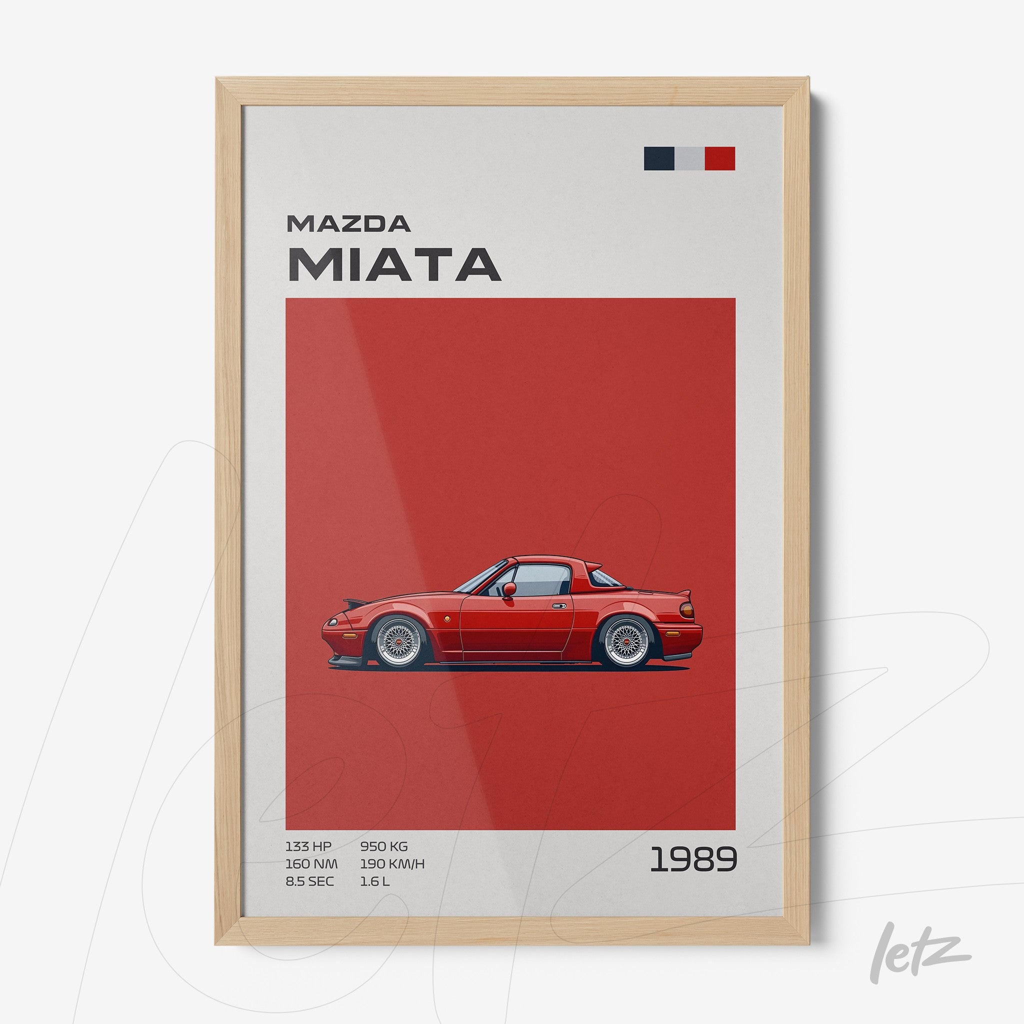 framed graphic art of Mazda Miata car in red background with light wooden frame