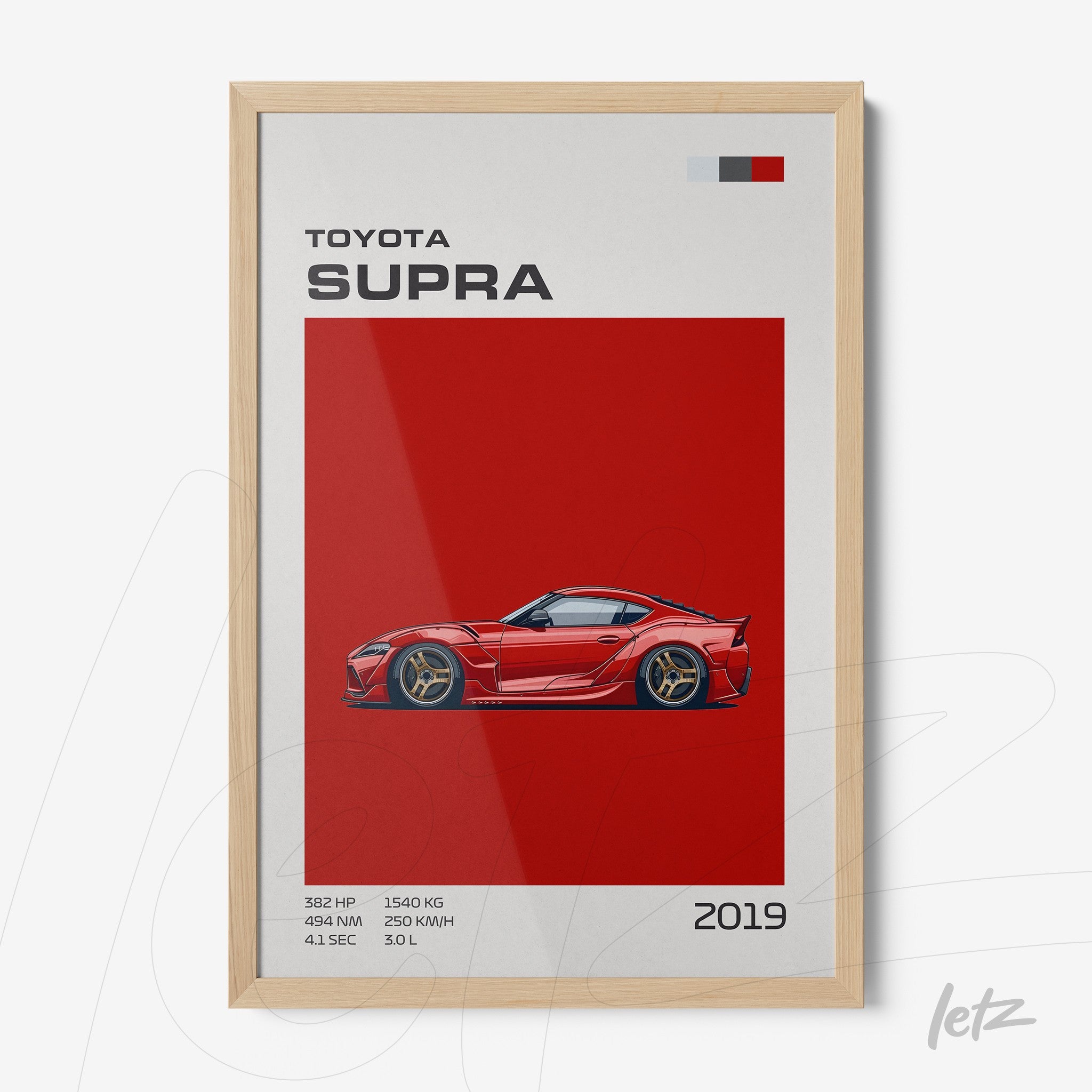poster art of 2019 toyota supra on red background with light wood frame
