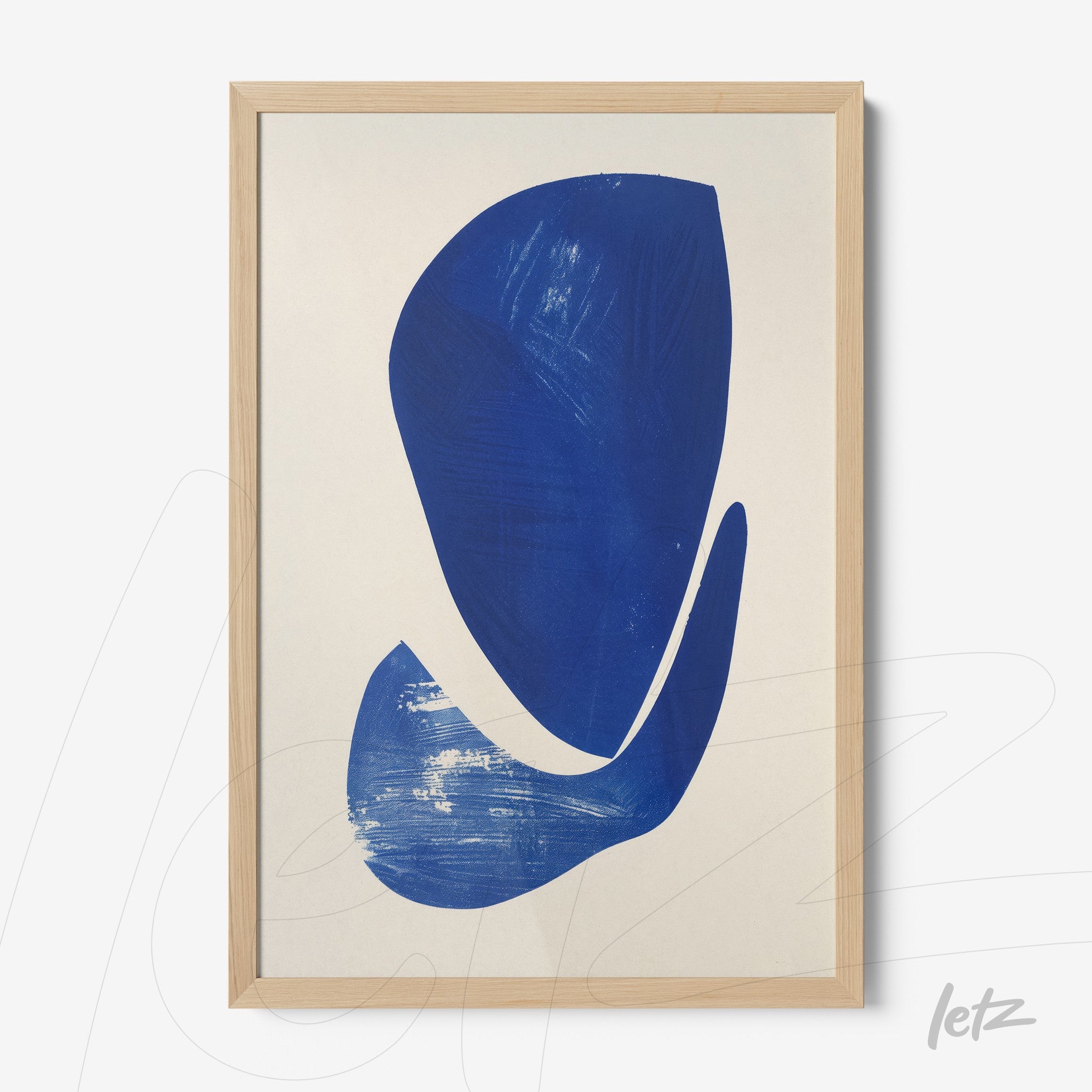 abstract wall art in blue with light wood frame