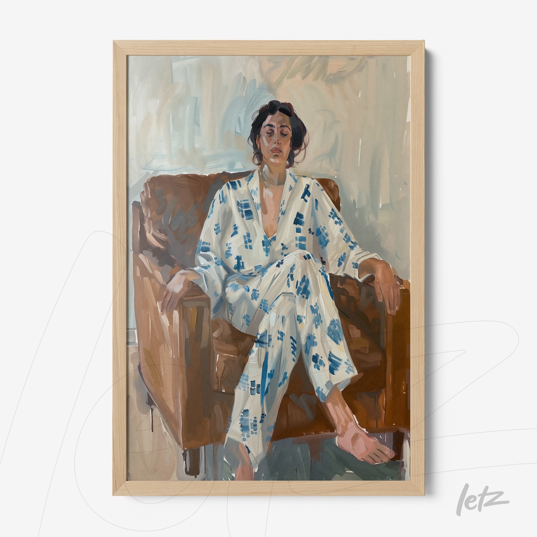 framed artwork of a woman sitting on a sofa wearing a blue and white pajama, light wood frame