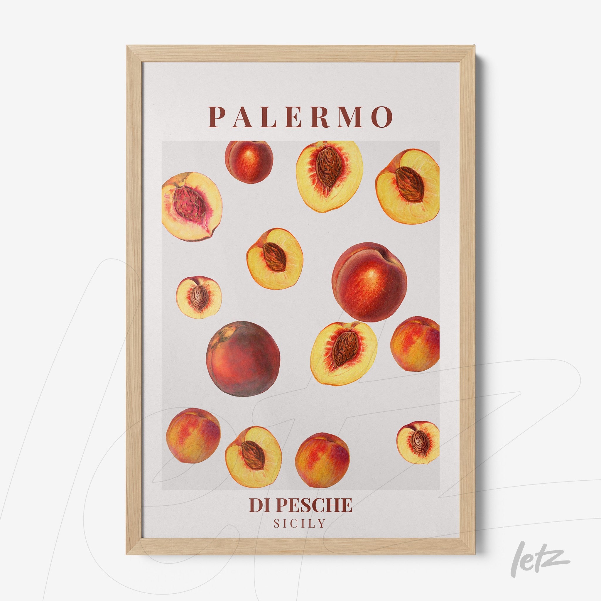 framed wall art featuring artistic illustration of peaches with light wood frame and white background