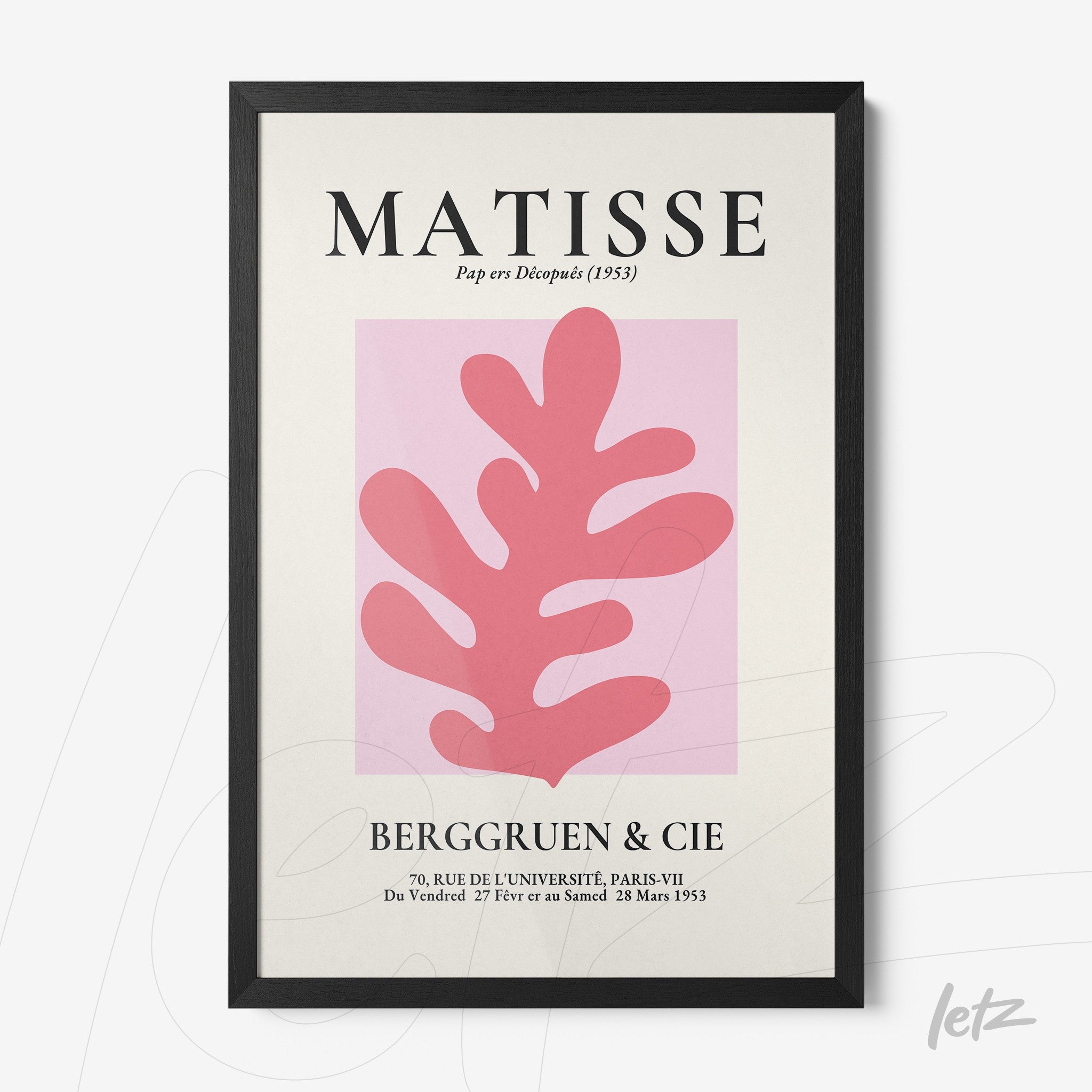 framed modern art piece showcasing pink leaves on a light background with black frame