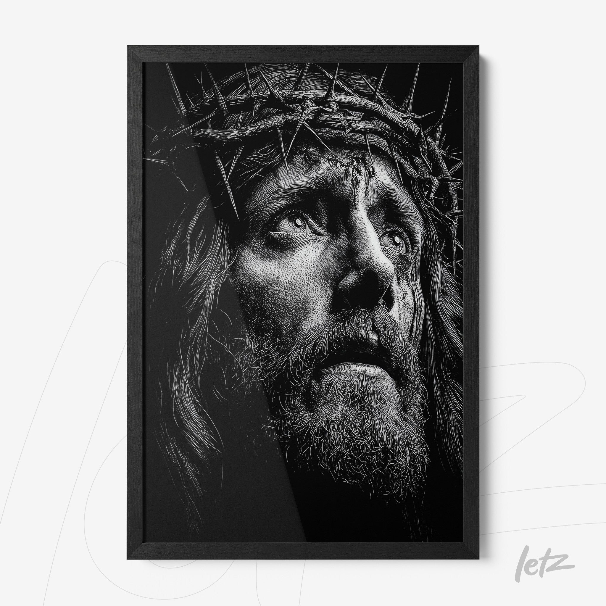 black and white framed wall art of a detailed portrait of a man wearing a crown of thorns