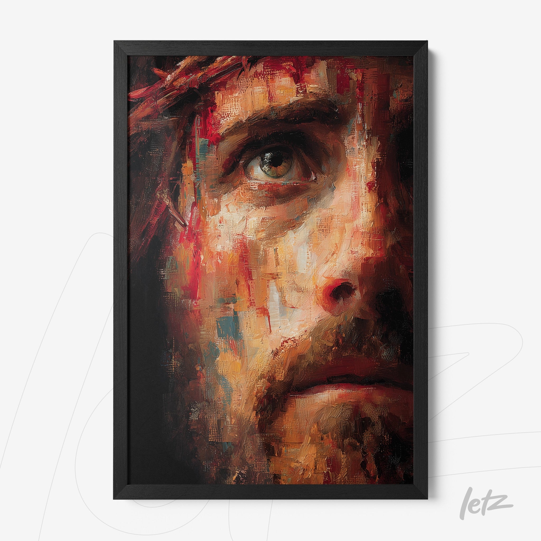 framed artwork with an expressive portrait of a male face featuring vivid texture elements