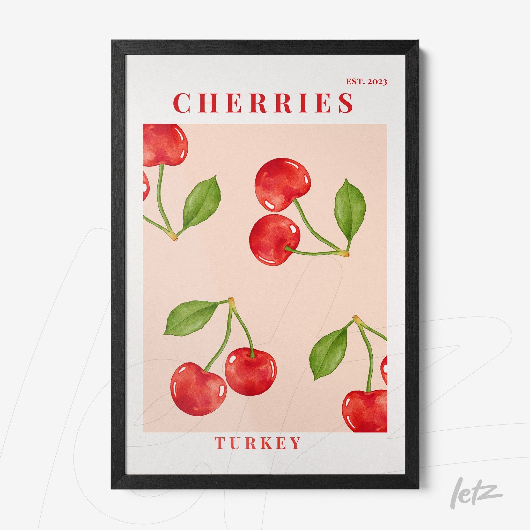 framed illustration of red cherries on a pink background with black frame