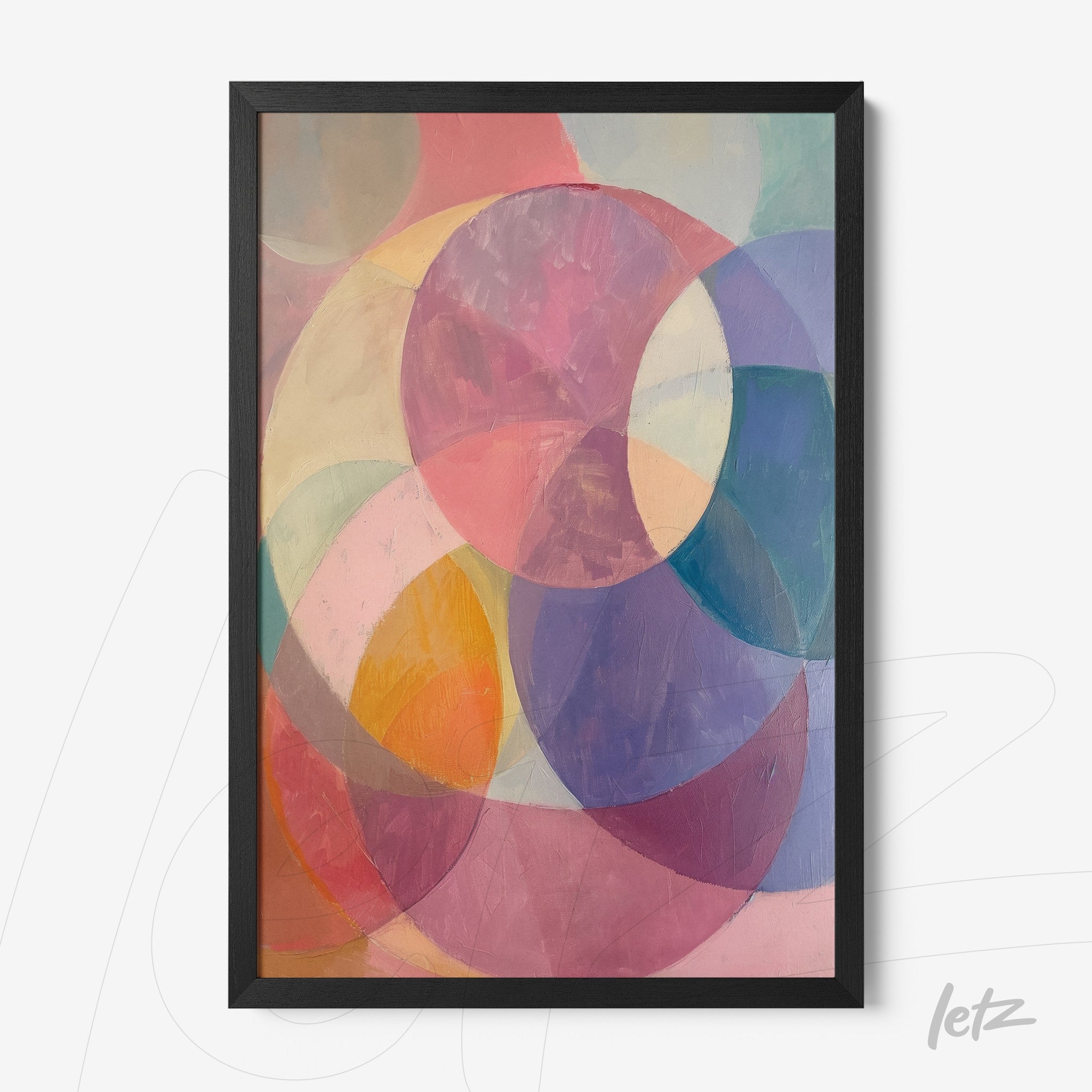 framed abstract art featuring pastel colors and circular shapes with a black thin frame