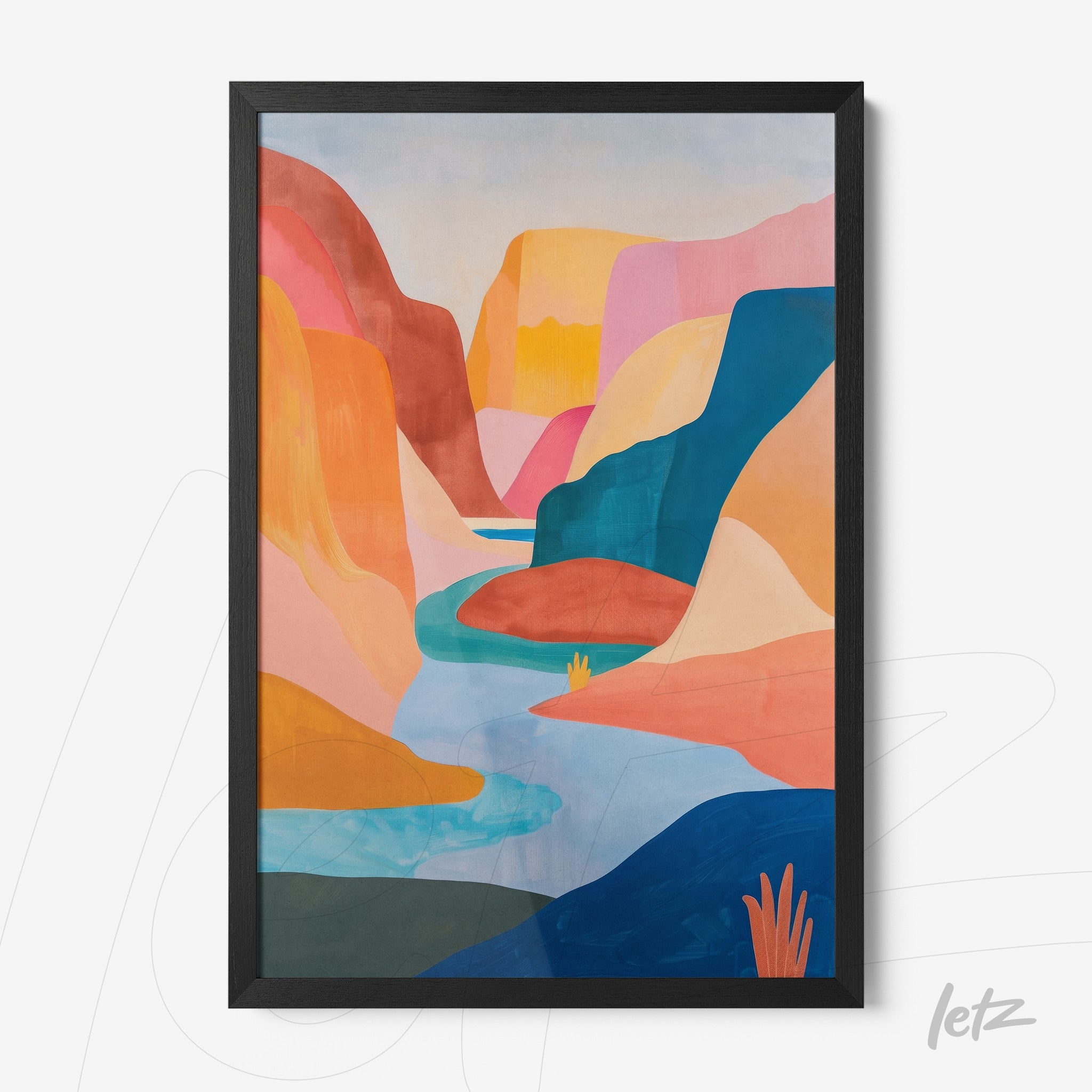 framed artwork of a colorful canyon landscape with a river