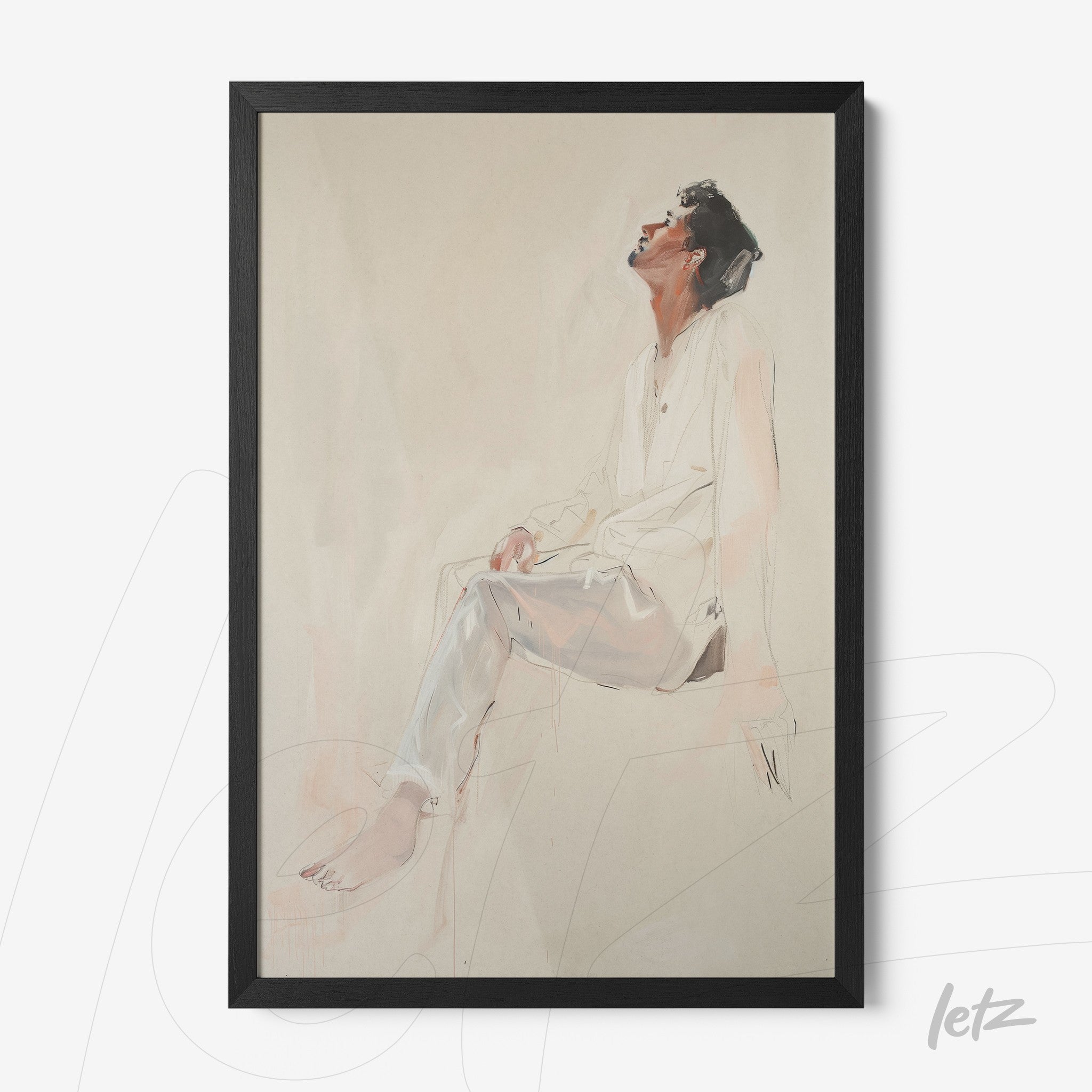 framed artwork of a man sitting in a contemplative pose with a black thick frame