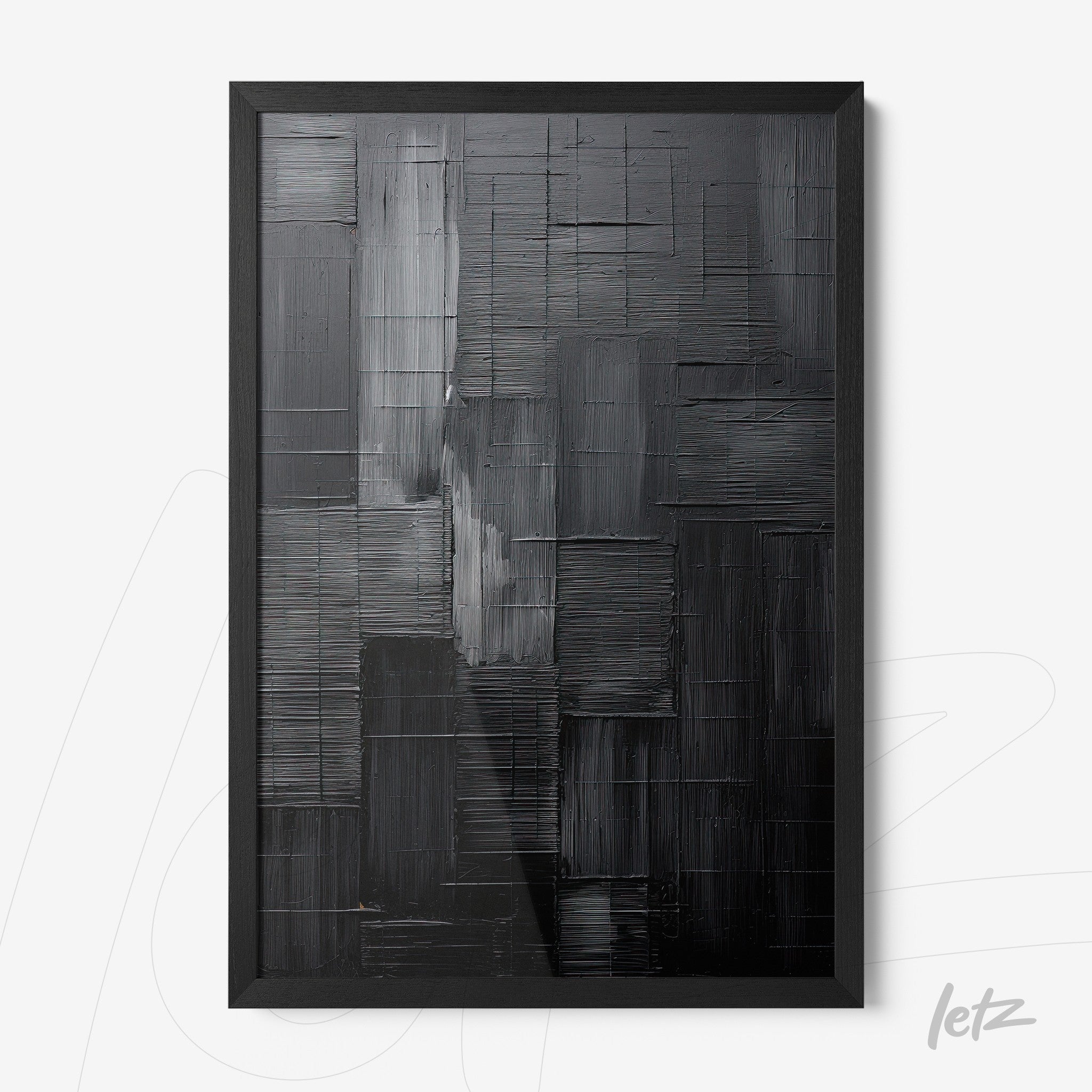 abstract wall art in shades of gray with bold texture framed in black
