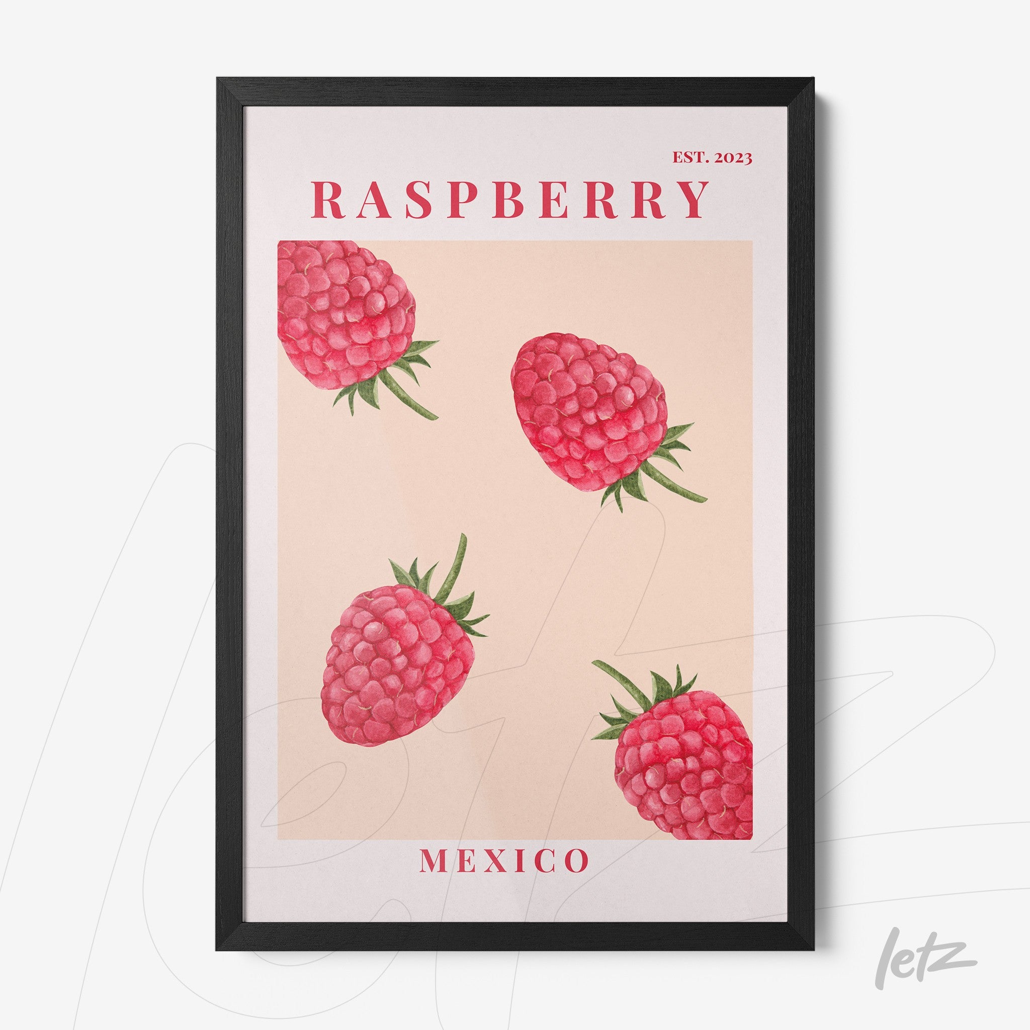 framed art featuring raspberries on a soft background with black frame