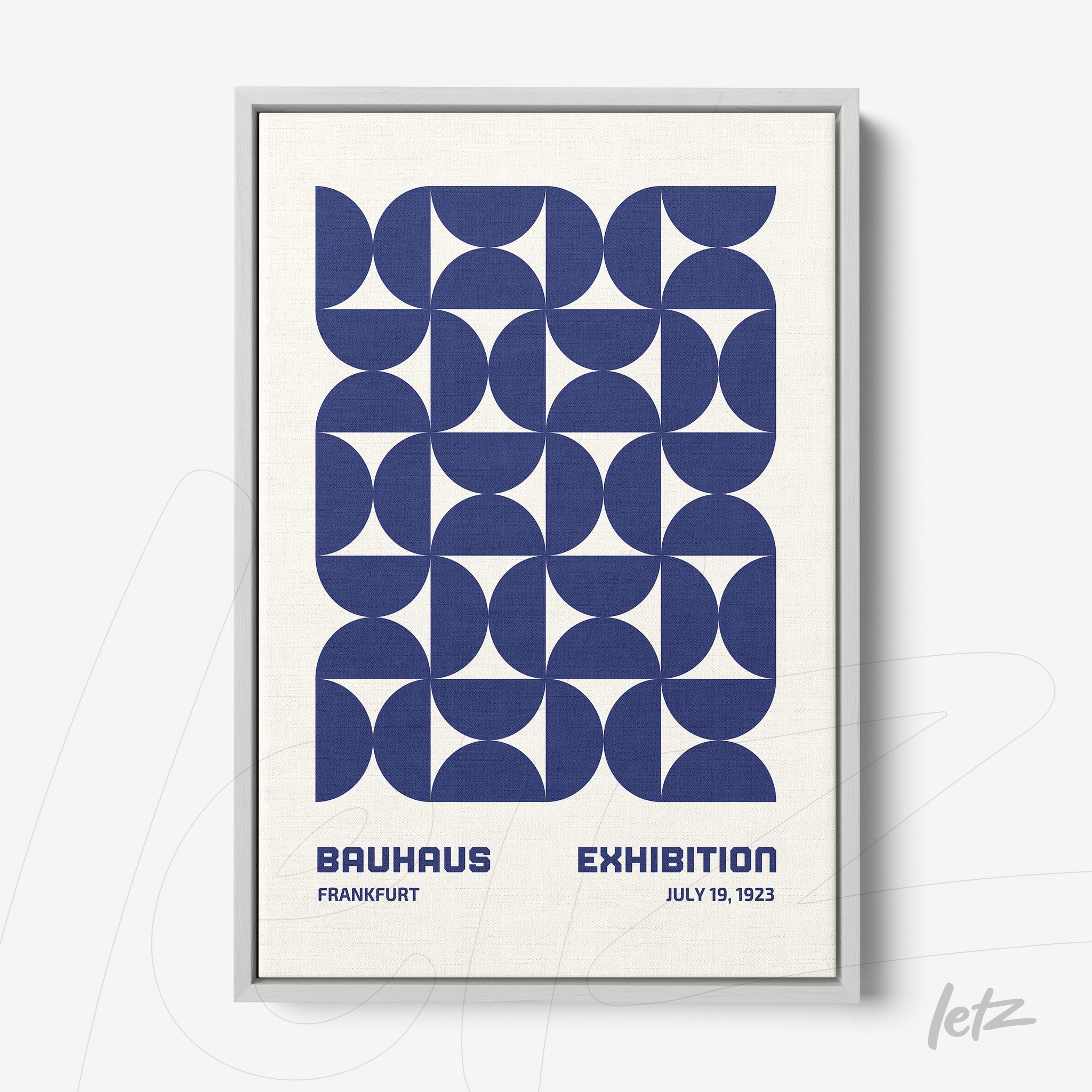 poster with blue geometric illustration in silver frame