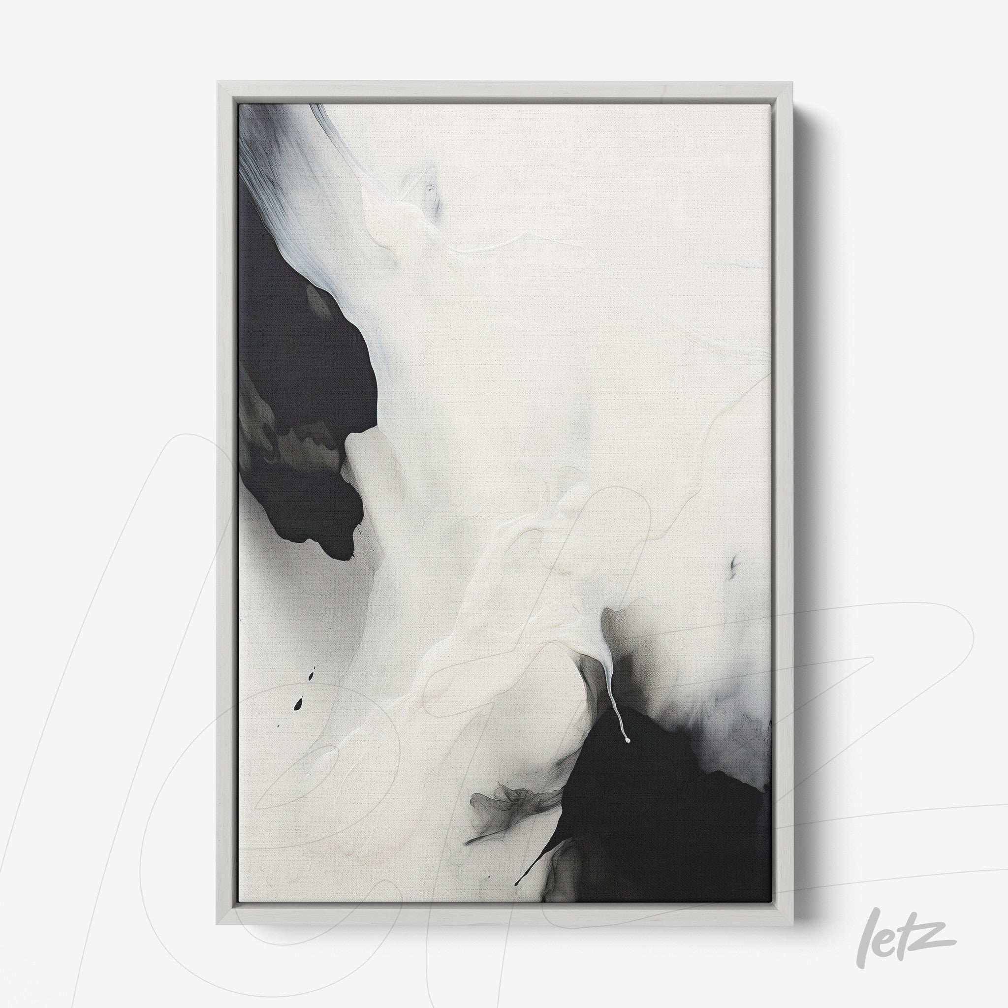 framed abstract wall art in black and white with silver frame