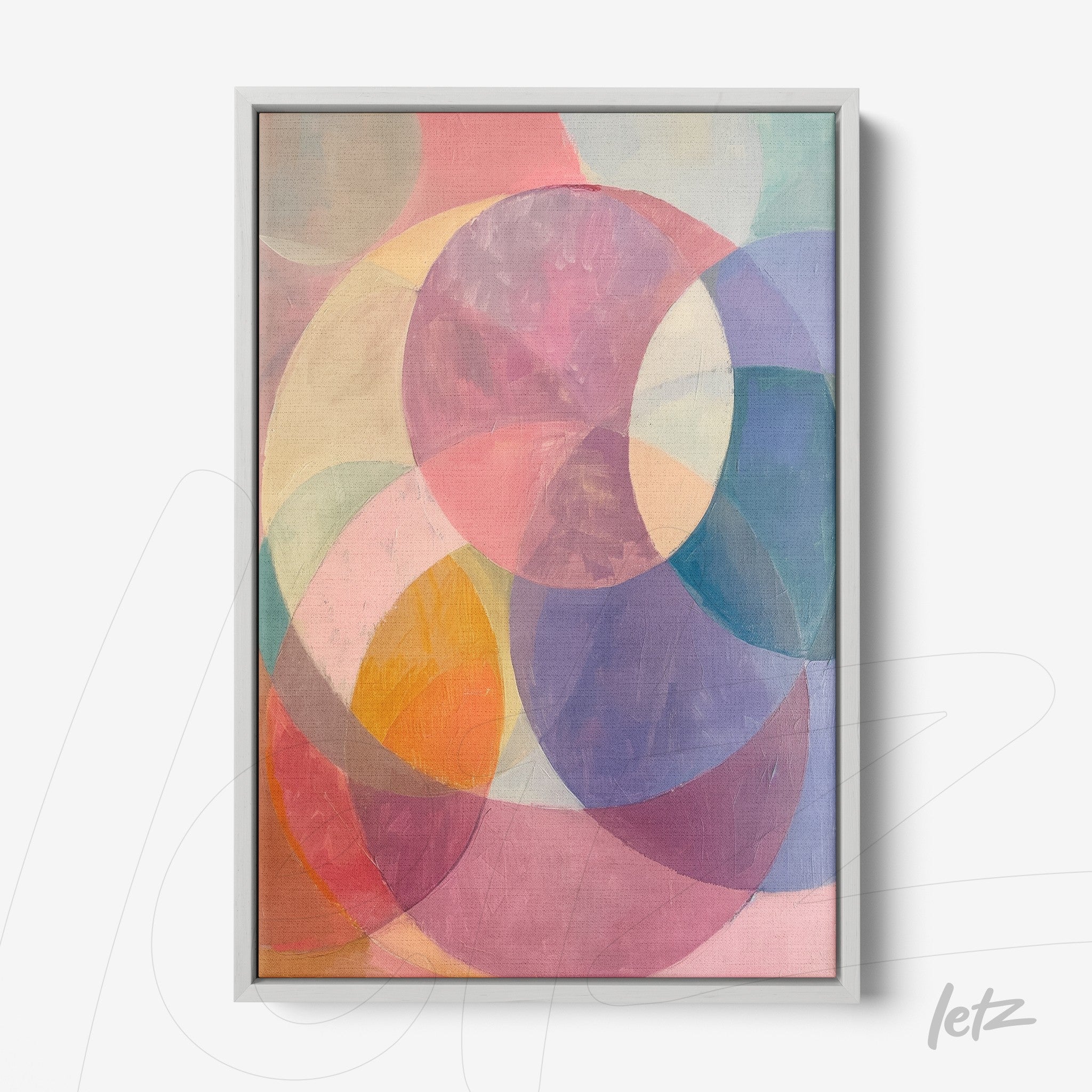 abstract wall art in pastel tones featuring overlapping circles in silver frame